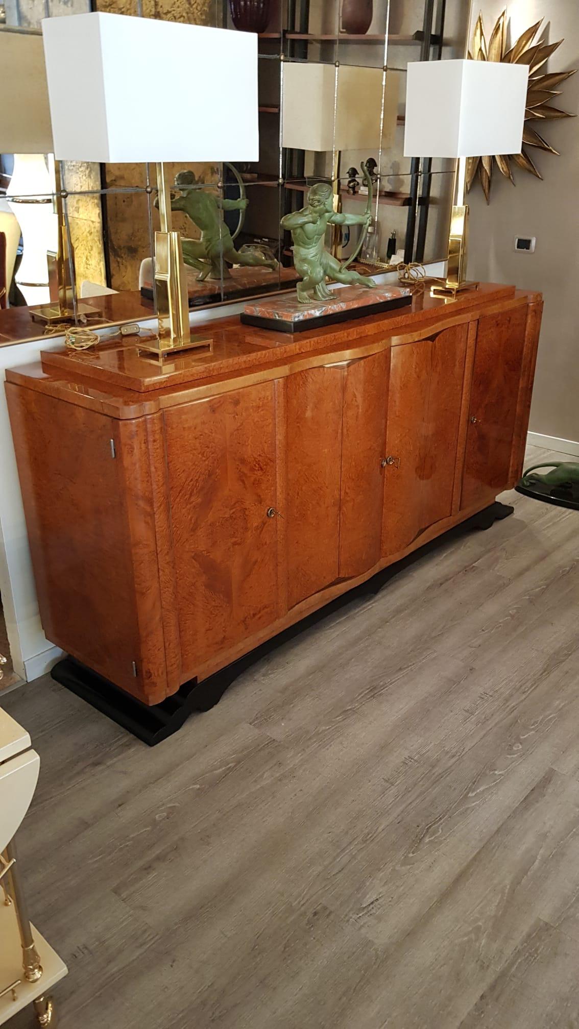 Art Deco Period Tuja Veneer credenza from France. 
Size: 202 x 50 cm, H 96 cm
Restoration: conservative 
A video of this item is available upon request.