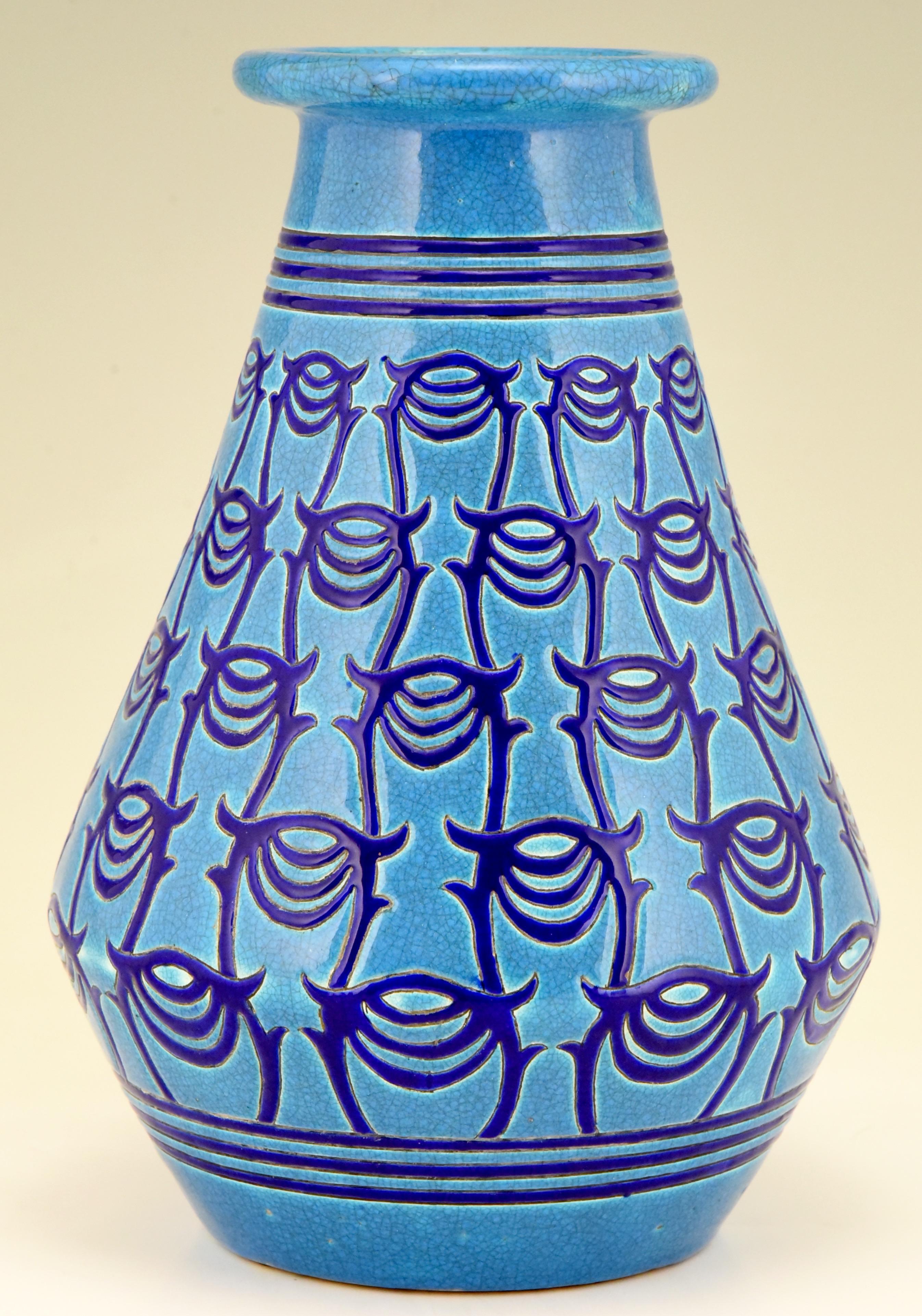 Longwy Primavera Art Deco ceramic vase in turquoise blue with dark blue pattern. France 1925. 
This French Art Deco vase was made by Longwy for Atelier Primavera, the design studio of the Paris department store “Les Grands Magasins du