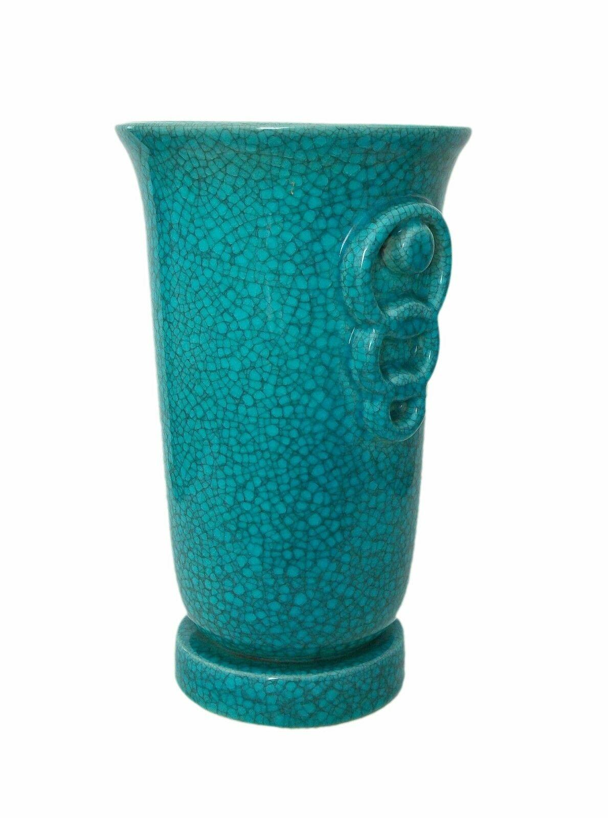 Extraordinary Art Deco turquoise crackle glaze vase - featuring a trumpet form shape on a plinth base with twin handles - signed on the base (model number 1344-O) - Belgium - circa 1930's.

Excellent/mint antique condition - no loss - no damage -