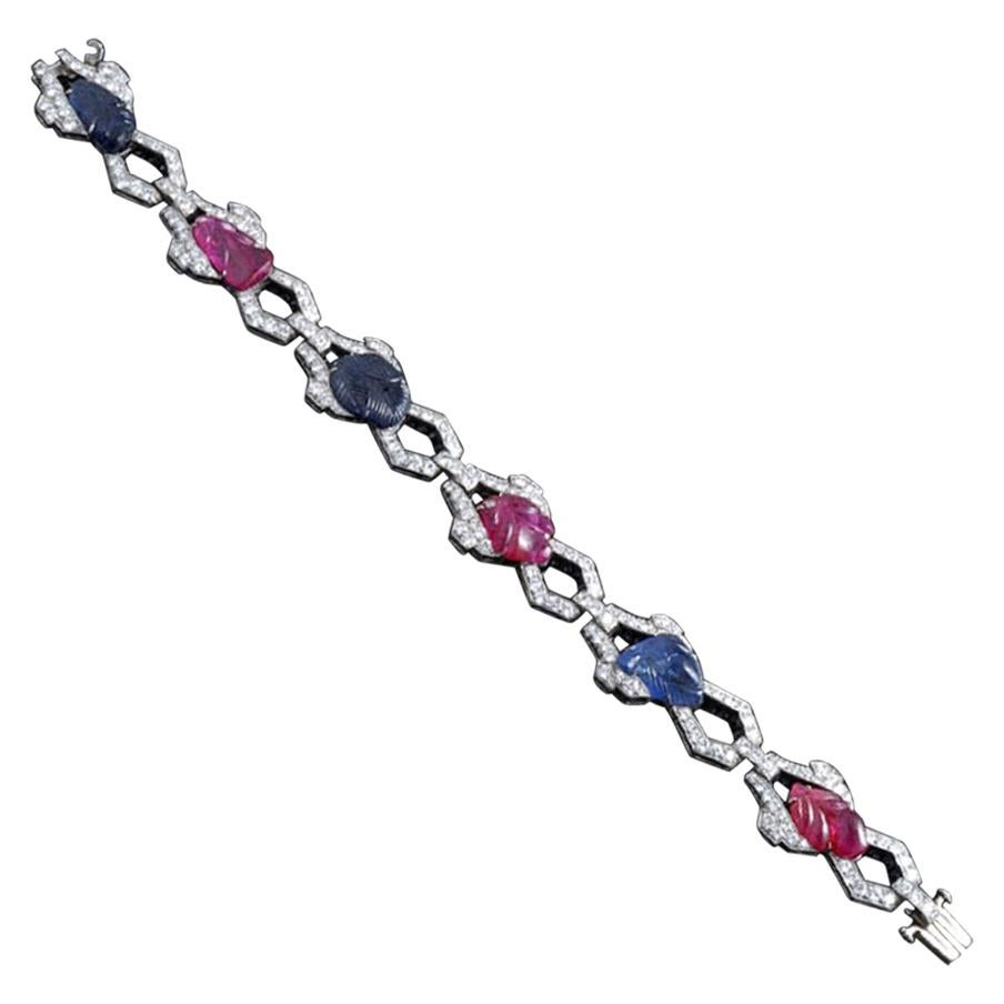 Art Deco "Tutti Frutti" Carved Sapphire and Ruby and Round Diamond Bracelet For Sale