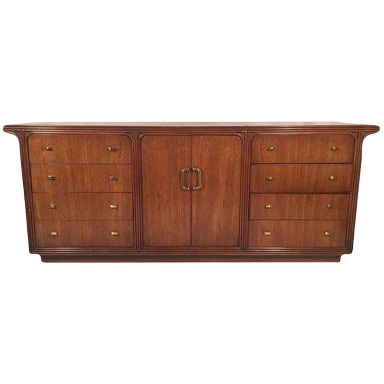 Art deco style dresser by Century Furniture features brass hardware and heavy, solid construction. Good vintage condition with marks to finish, see photos for condition details.
For a shipping quote to your exact zip code, please message us.
