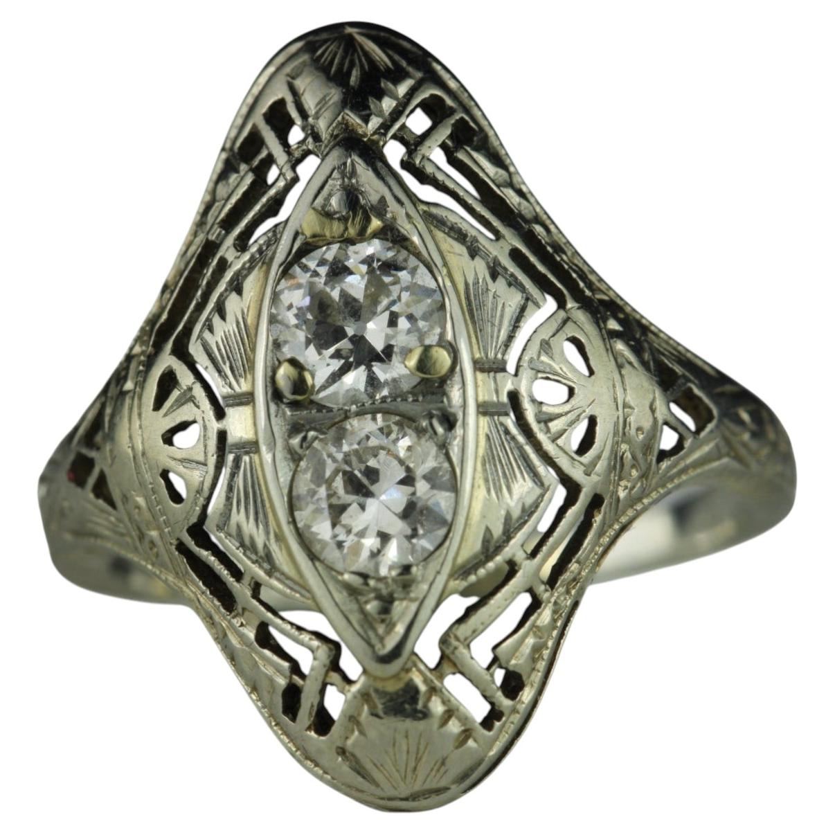 Art Deco Twin Diamond and Filigree Dinner Ring For Sale