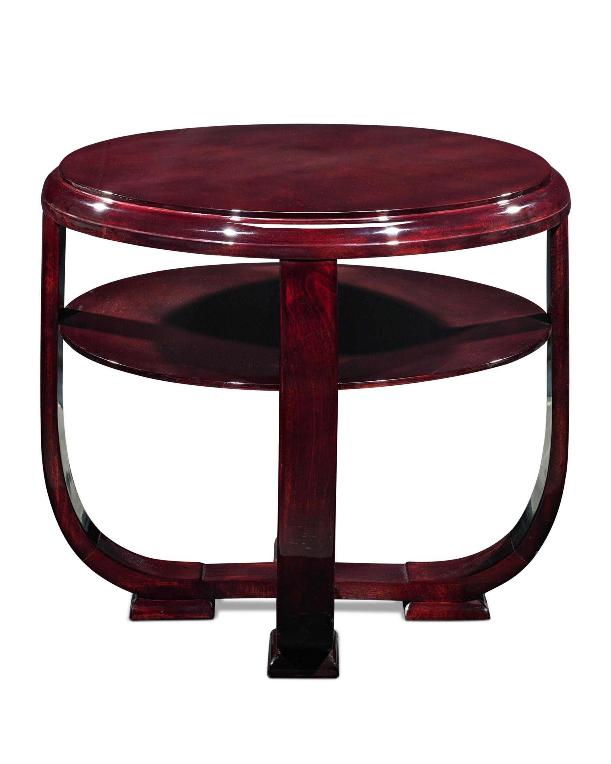 This magnificent Art Deco coffee table is crafted of fine, polished mahogany, displaying the highest level of form and functionality of the early 1920s. Interest in Art Deco furnishings has increased dramatically and quality period examples, such as