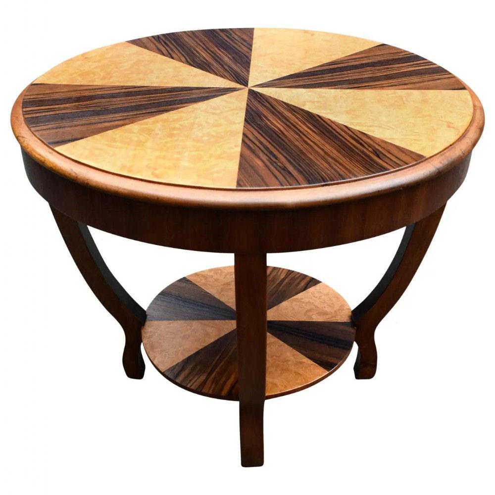Very stylish Art Deco walnut and maple table with two tiers dating to the 1930s. Beautifully shaped and fully restored to showroom condition. Wonderfully figured sectioned walnut and blonde Maple veneers to the top and base. A statement piece which
