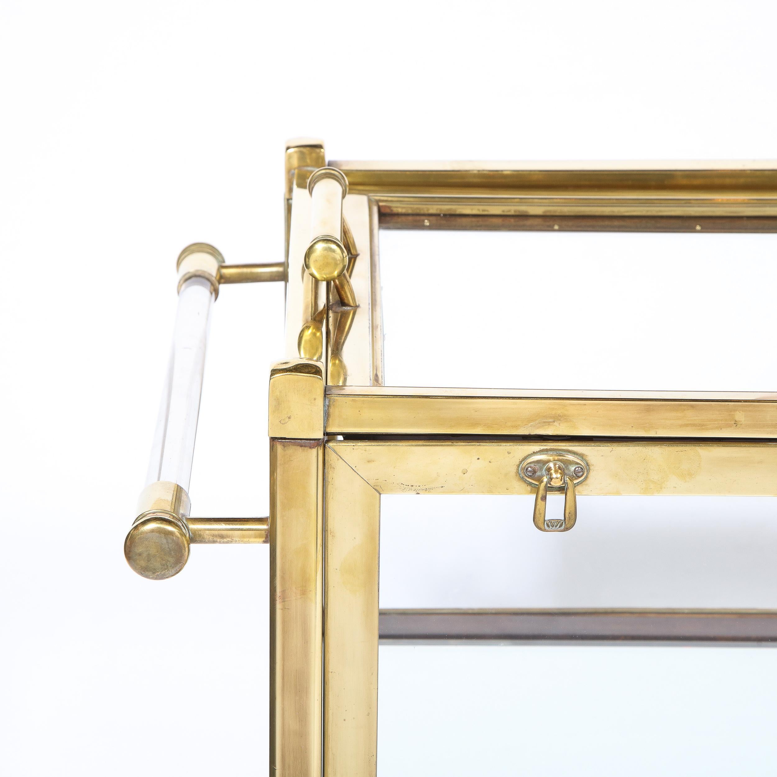 German Art Deco Two Tier Polished Brass, Walnut and Glass Bar Carts on Castors