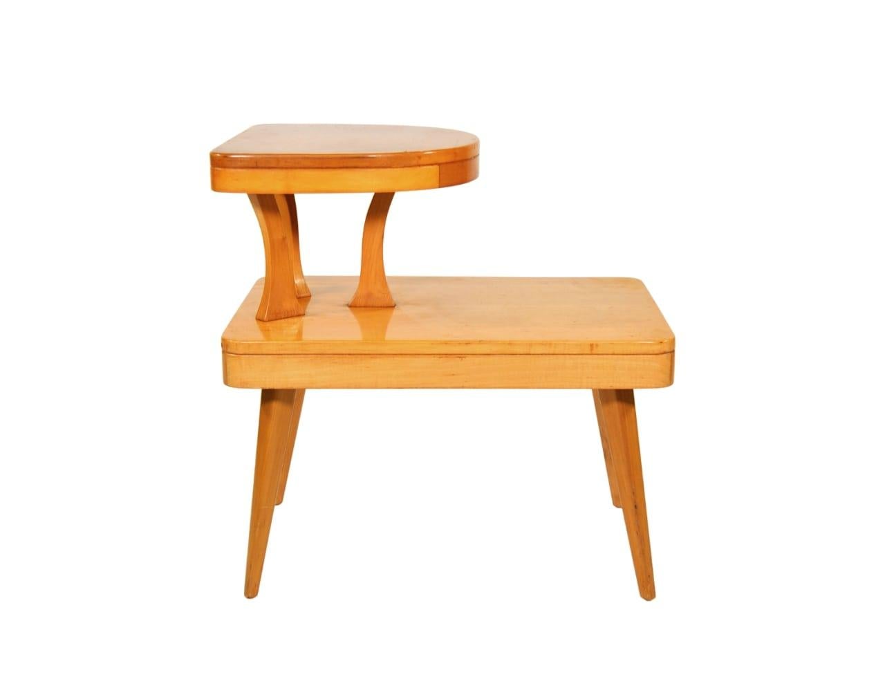 Rare original Art Deco two-tier blonde occasional table attributed to Jindrich Halabala for Spojene Up Závody. The vintage end table features a two-tiered design with rounded edges. This step table has a truly unique shape and silhouette! 