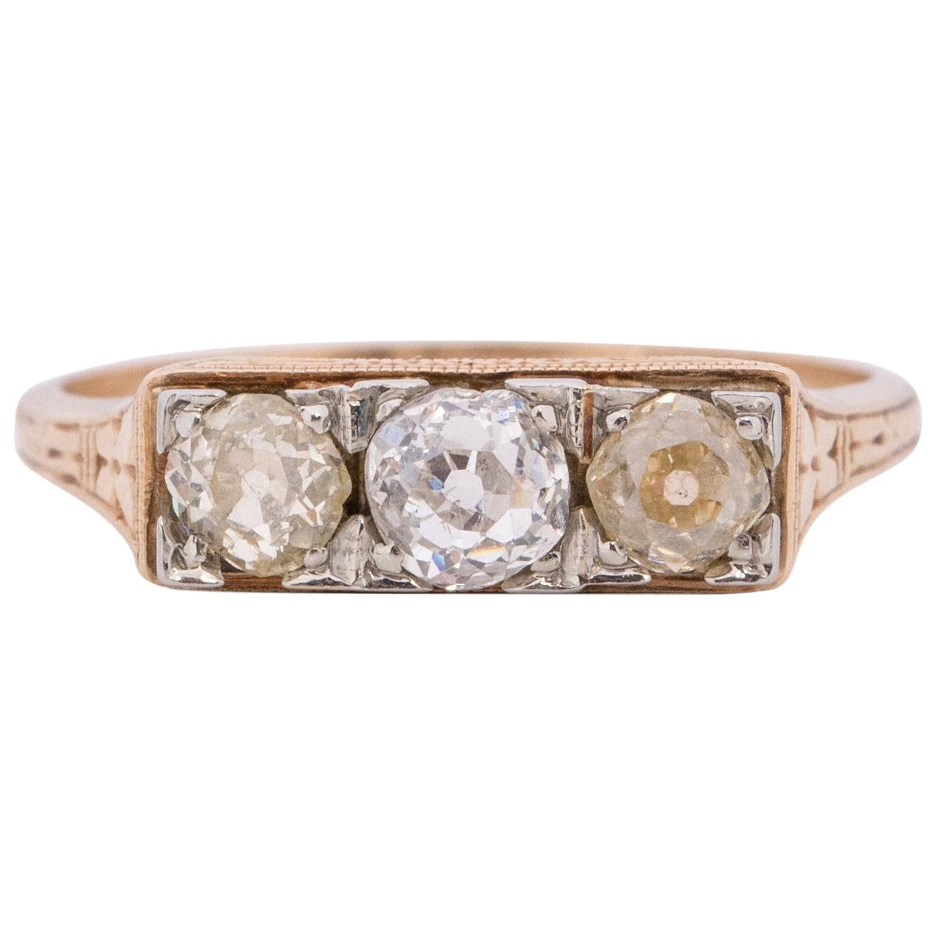 Art Deco Two-Tone 14K Yellow Gold and 18K White Gold .95 Carat Three-Stone Ring