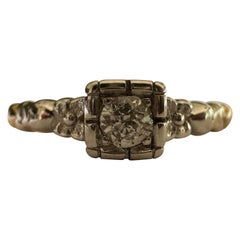 Anello solitario con diamante bicolore Art Deco