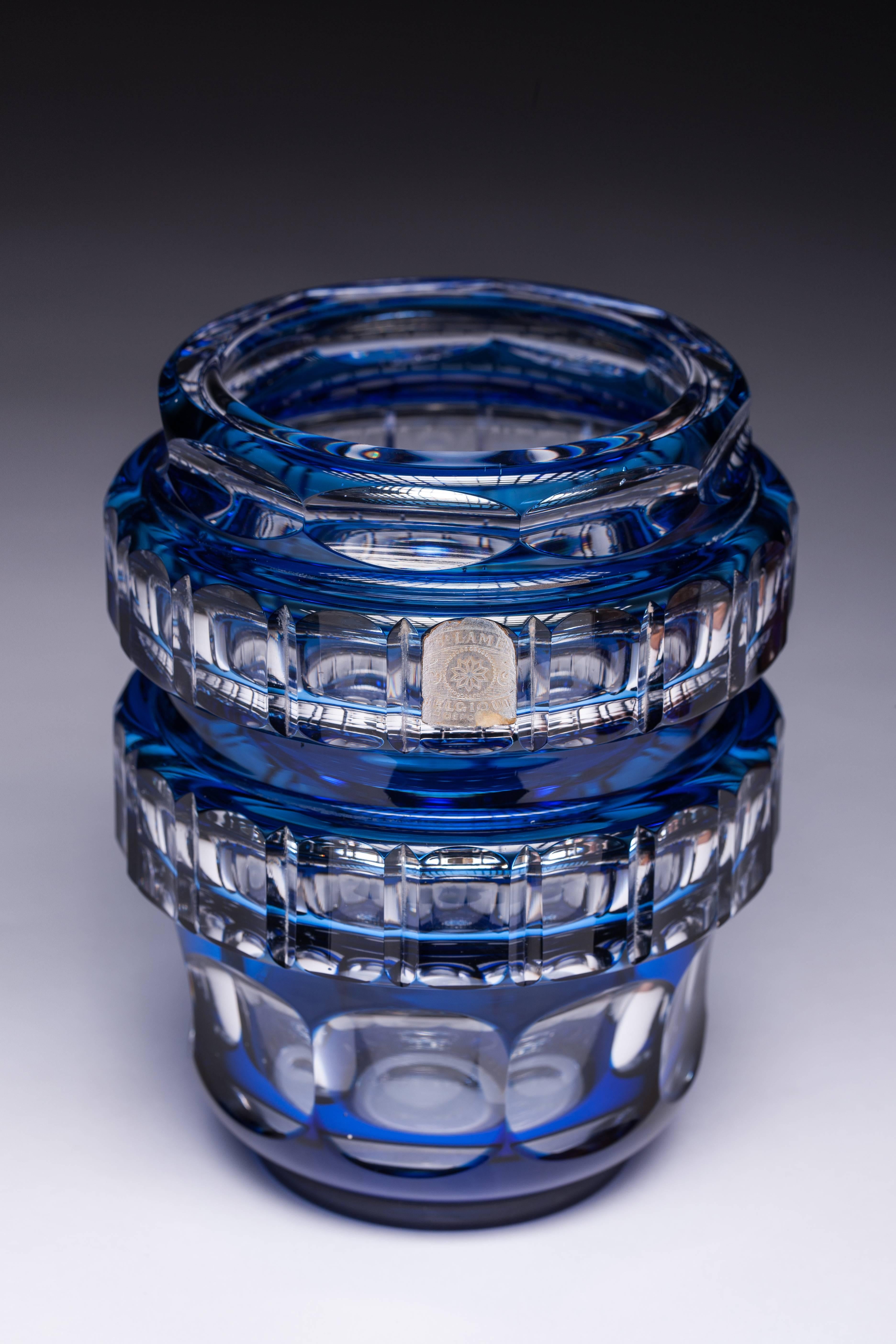 Val Saint-Lambert: Conical Vase style Art Deco, crystal clear, polished and double blue.

Val Saint Lambert is a Belgian crystal glassware manufacturer, founded in 1826 and based in Seraing. It is the official glassware supplier to King Albert