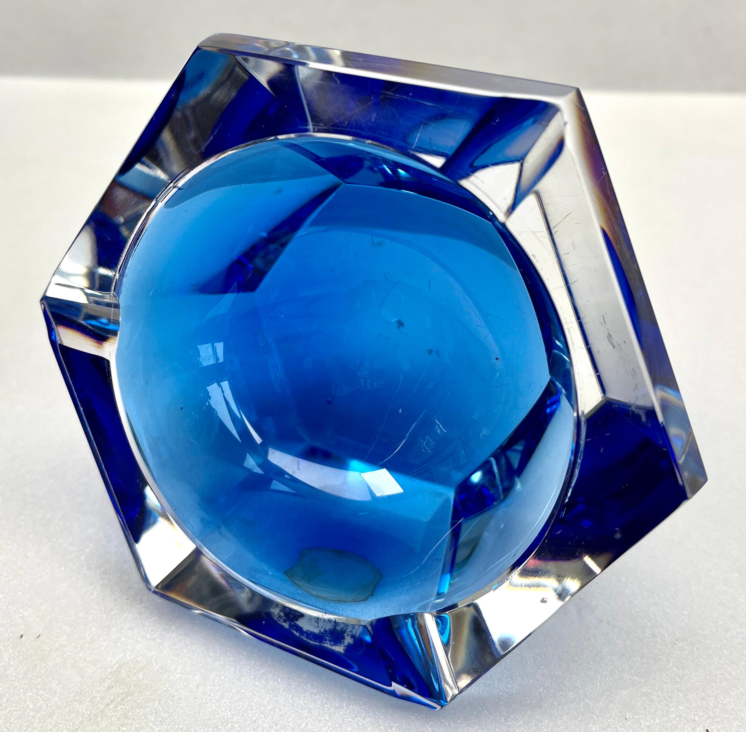 Art Deco Val Saint Lambert Label Cobalt Crystal Ashtray Faceted, 1950s

Beautiful Val Saint-Lambert  crystal vases, handcut Faceted, the glass is thick, 
deeply and evenly cut,
Val St. Lambert, circa 1950s.
Origin: Belgium in excellent
