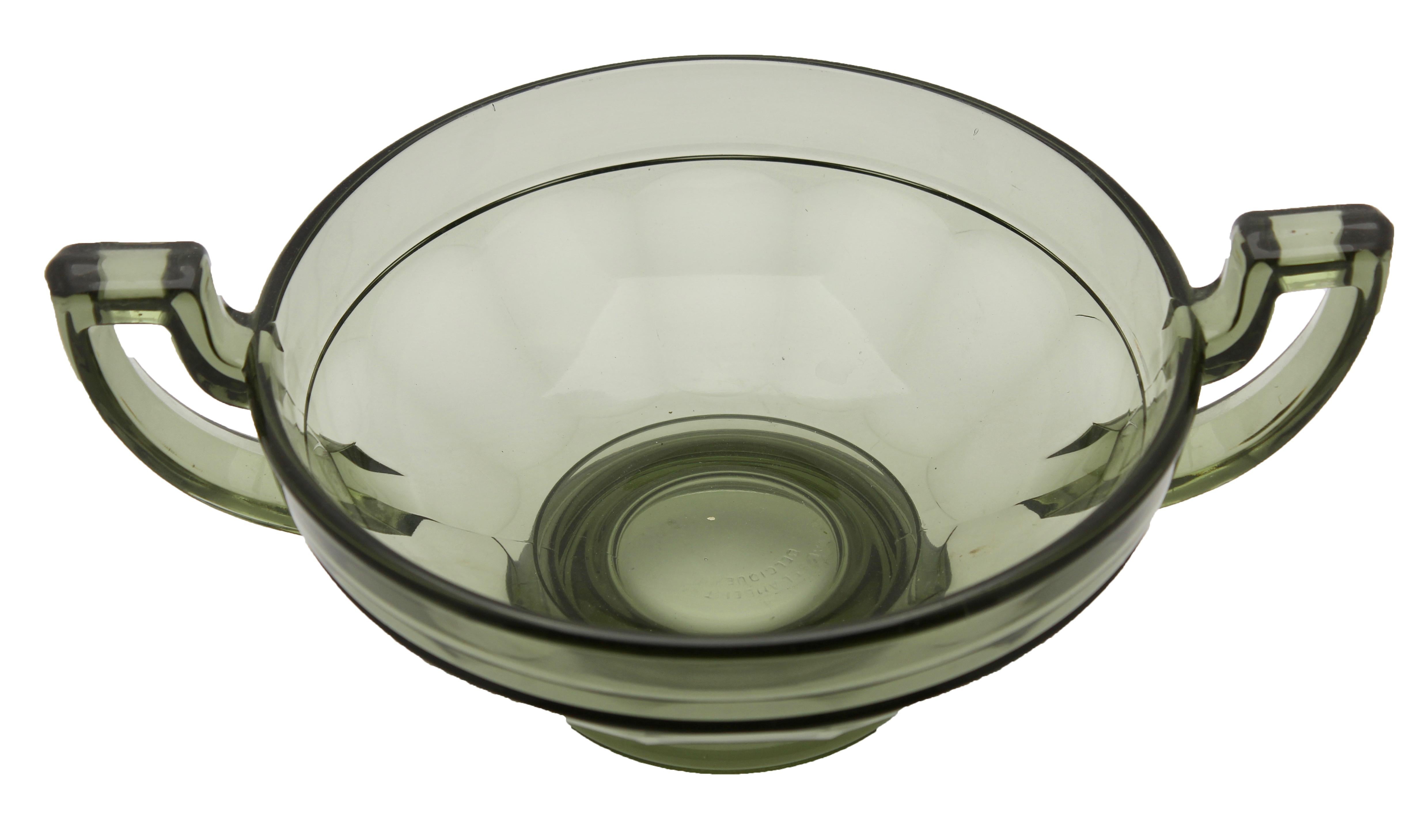 The circular version of this bowl design in amber glass, made by Val Saint Lambert for their Luxval series. The vase is marked on the inside: 