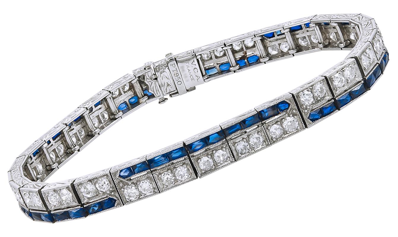 Platinum diamond and sapphire straight line bracelet, signed Van Cleef & Arpels.
Dimensions approx.  7
