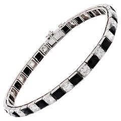 Art Line Line de Van Cleef 
Arpels en onyx et diamants