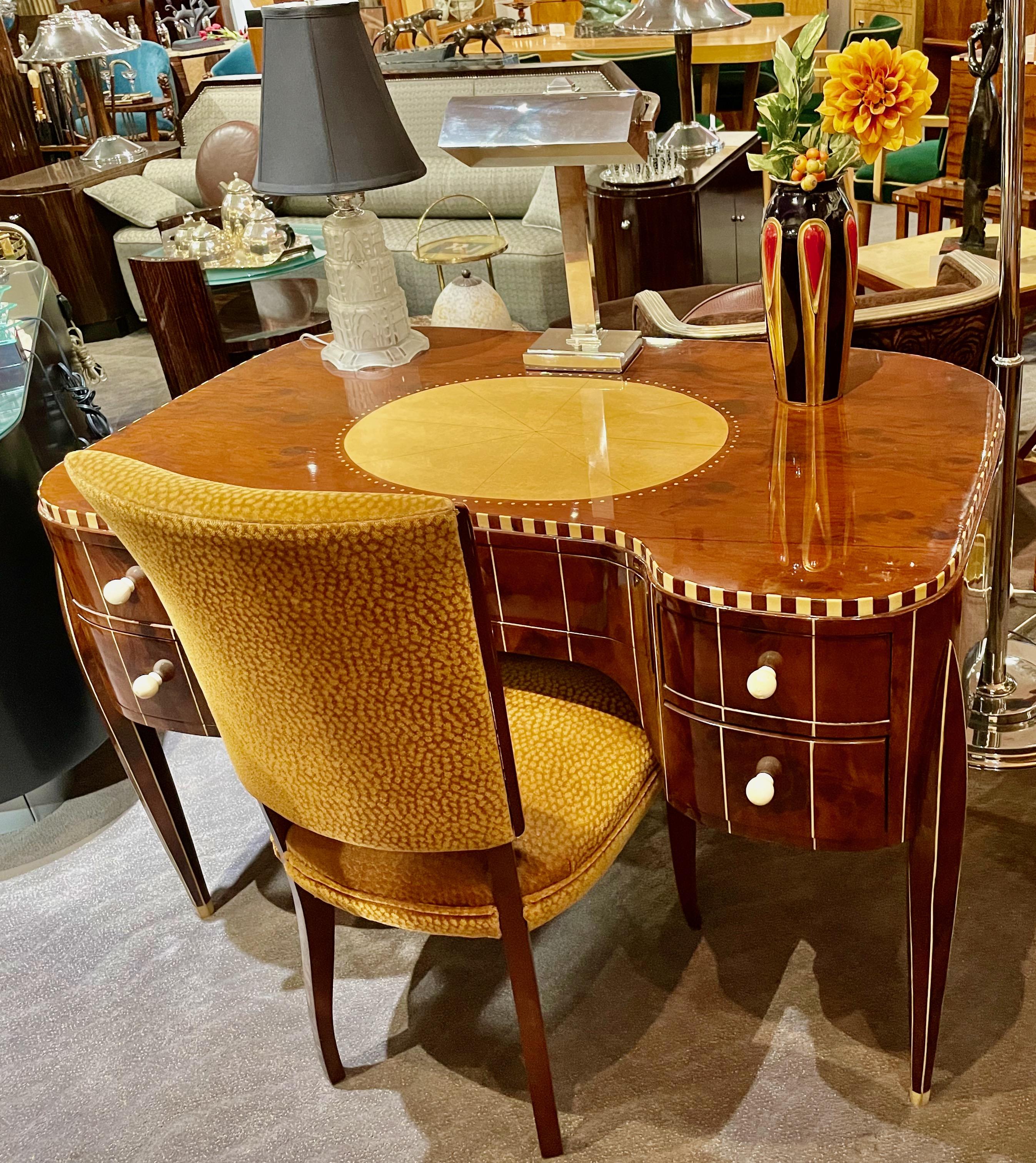 French Art Deco Desk In Style of Ruhlmann. Macassar wood was chosen and the “ivorite” plastic details were shaped and inlaid by master craftsmen working to create this timeless classic. A real signature of the Grand Art Deco period. The finish is