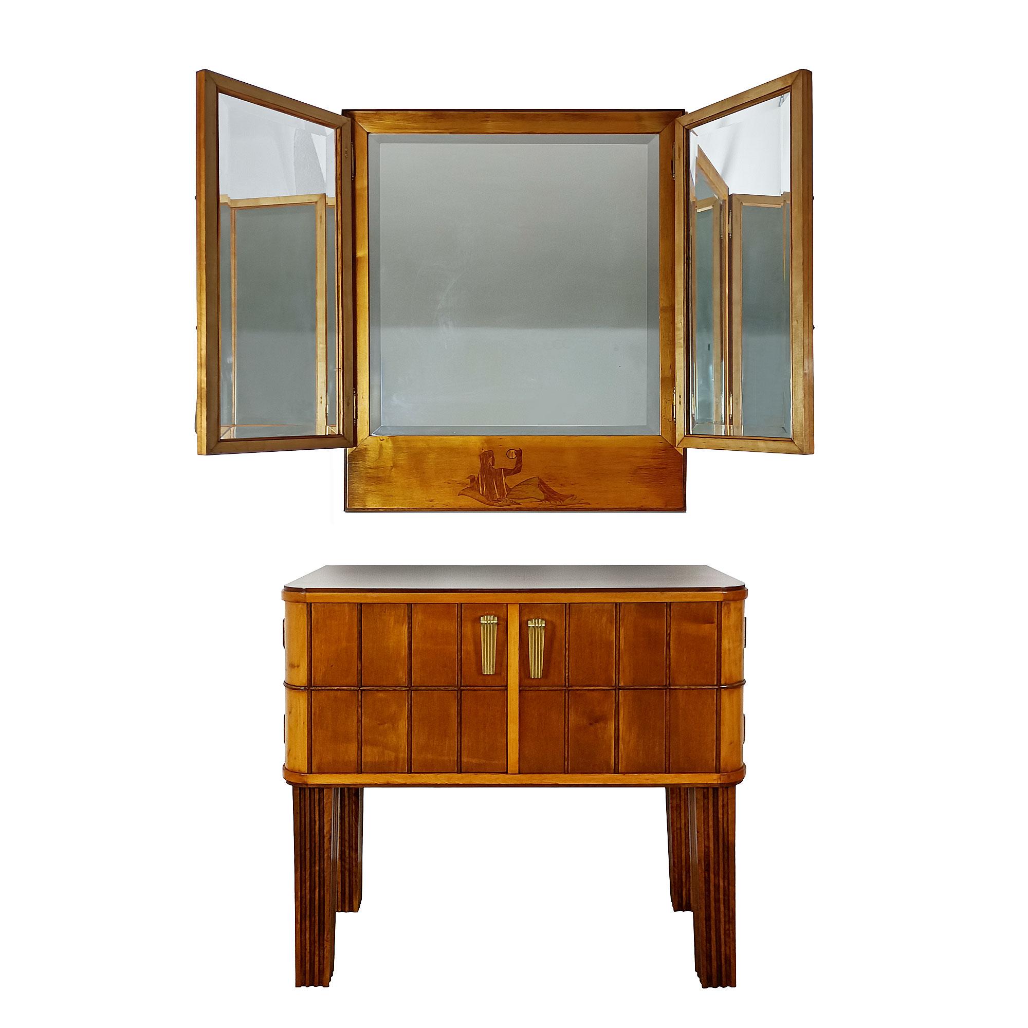 Art Deco vanity unit, solid walnut (legs and mouldings) and maple veneer. The lower unit opens onto two storage spaces surmounted by a triptych of bevelled mirrors hidden by two doors inlaid with the initials of the newlyweds and a feminine motif.