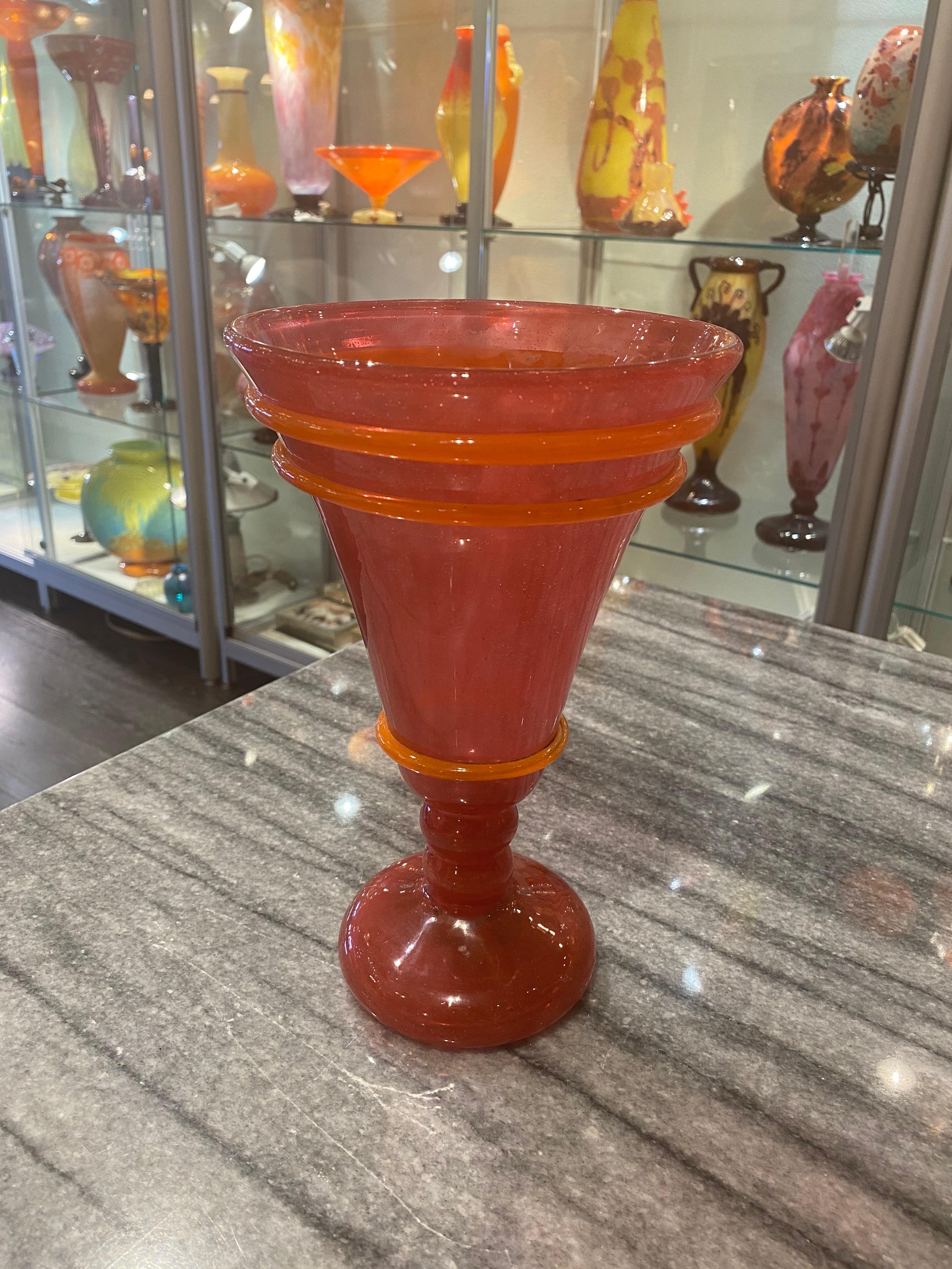 Art Deco glass vase by Charles Schneider in red colored glass with orange color glass trims.
Made in France,
circa 1924
Signature: Schneider.
