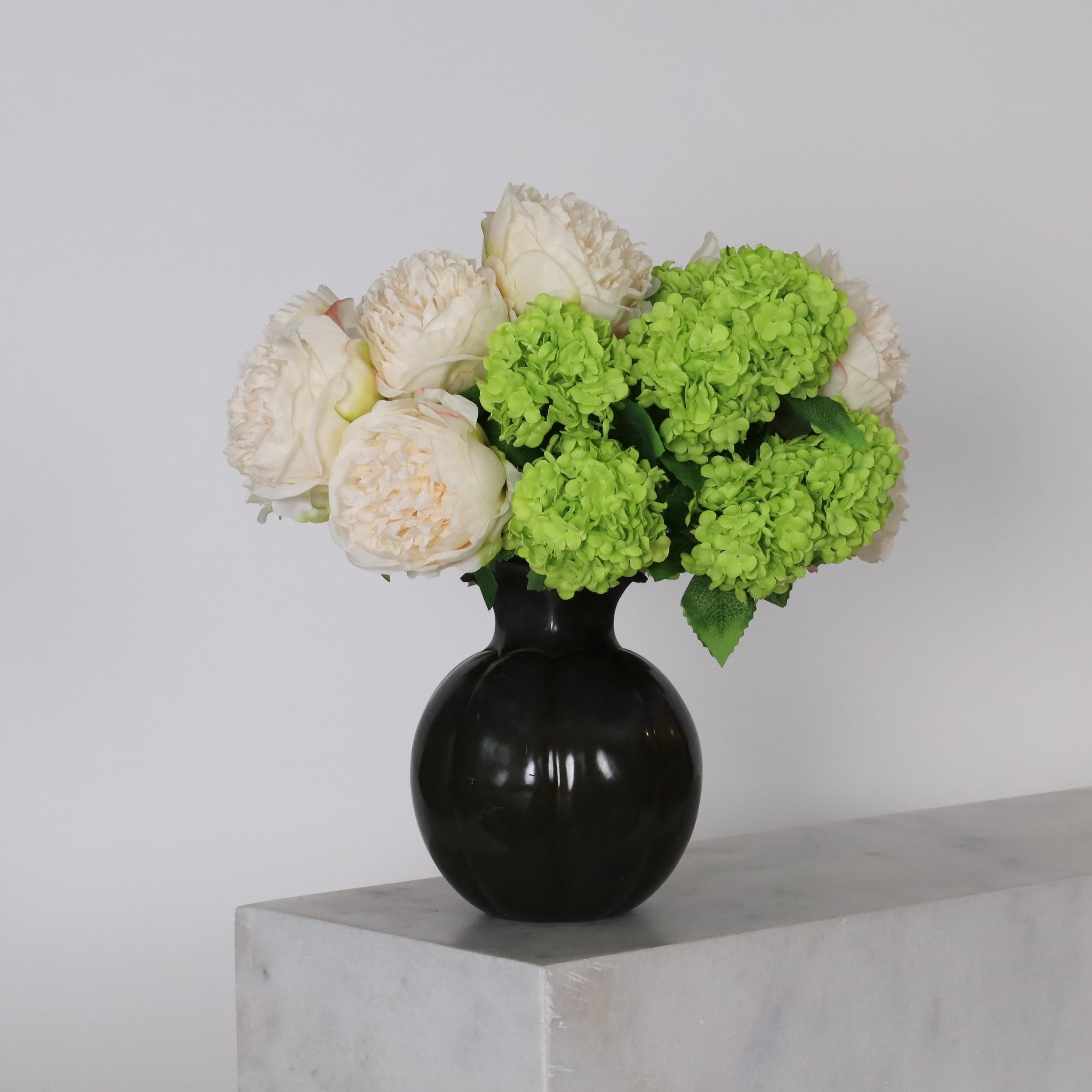 Substantial Discometal Vase designed by Just Andersen in the 1930s. An eye-catching installment. 

* A round discometal vase with square neck (very heavy)
* Designer: Just Andersen
* Model: D1754 (stamped 'Just D1754')
* Year: 1935
* Condition: Fair