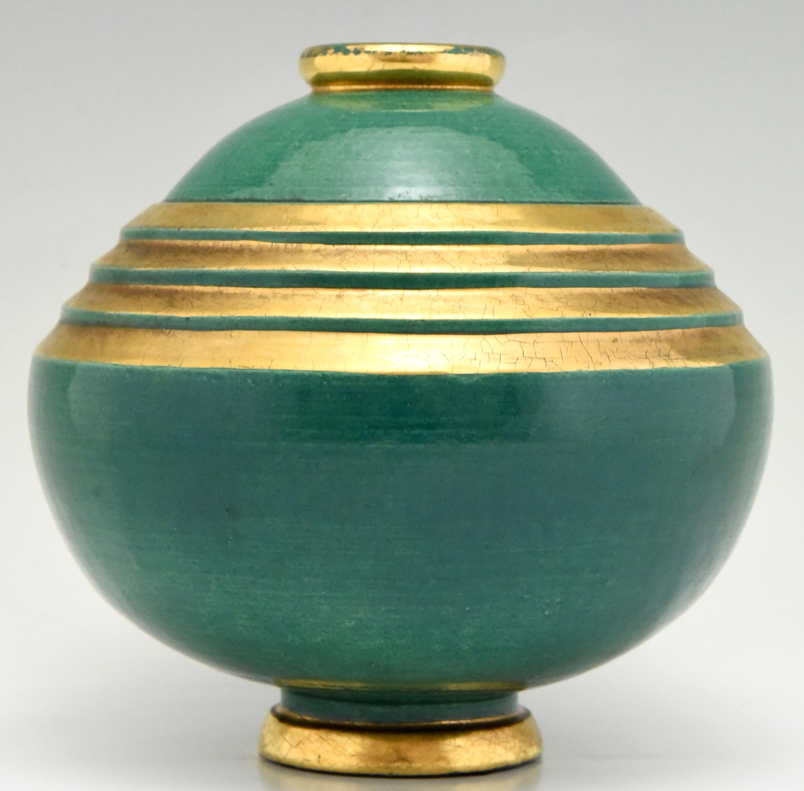 Beautiful green gold Art Deco vase in Grès ceramic.
The vase is signed Frassati for Marcel Guillard and executed by Etling Paris, France, 1925.
Literature:
“Art Deco complete” Alastair Duncan?“Dictionnaire Biographique des artistes