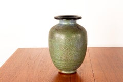 Art Deco vase, in speckled green glazed stoneware, by Roger Guérin, 1930s.
