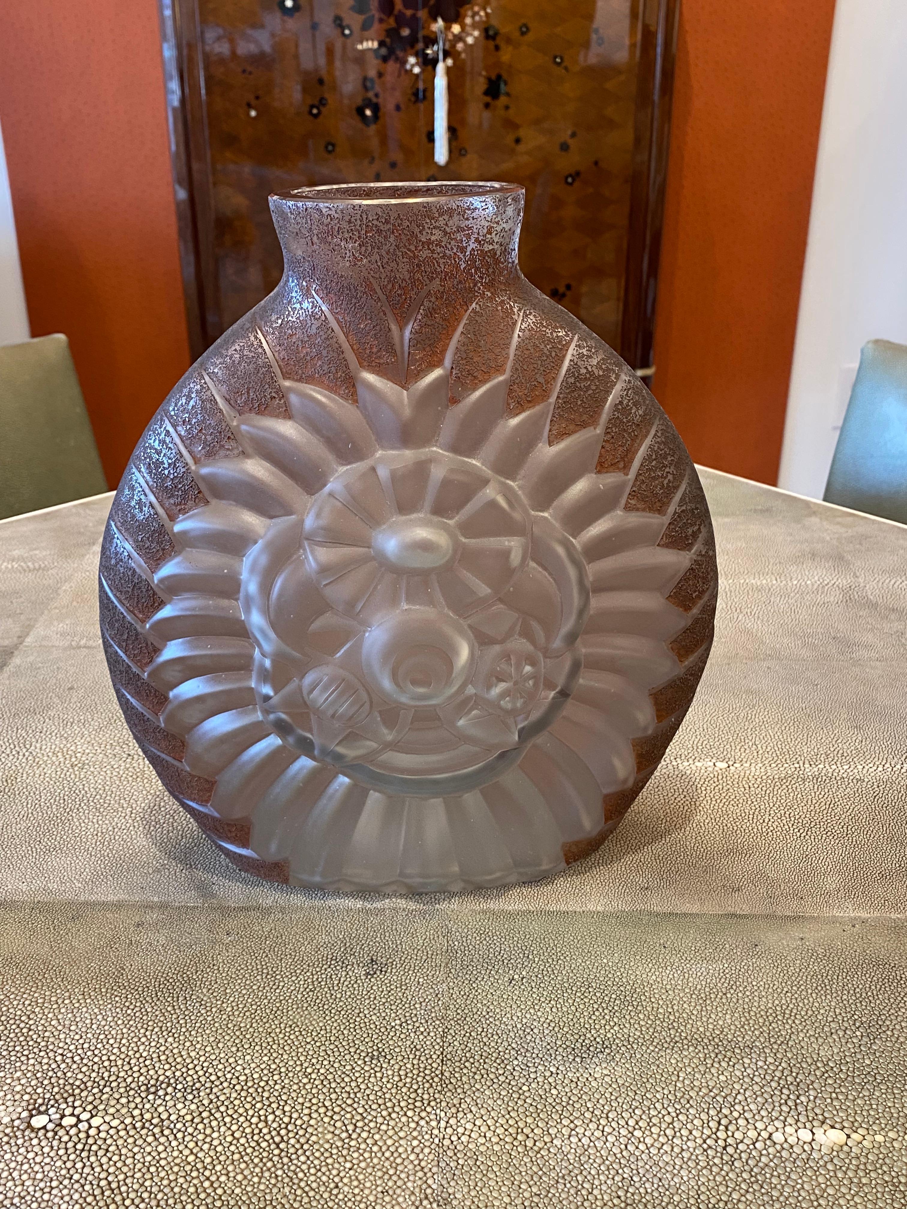 Art Deco molded glass and acid etched glass vase by D. Gueron (Degue) depicting Deco flowers bouquet.
Made in France 
Circa: 1930
Signature: Gueron.
