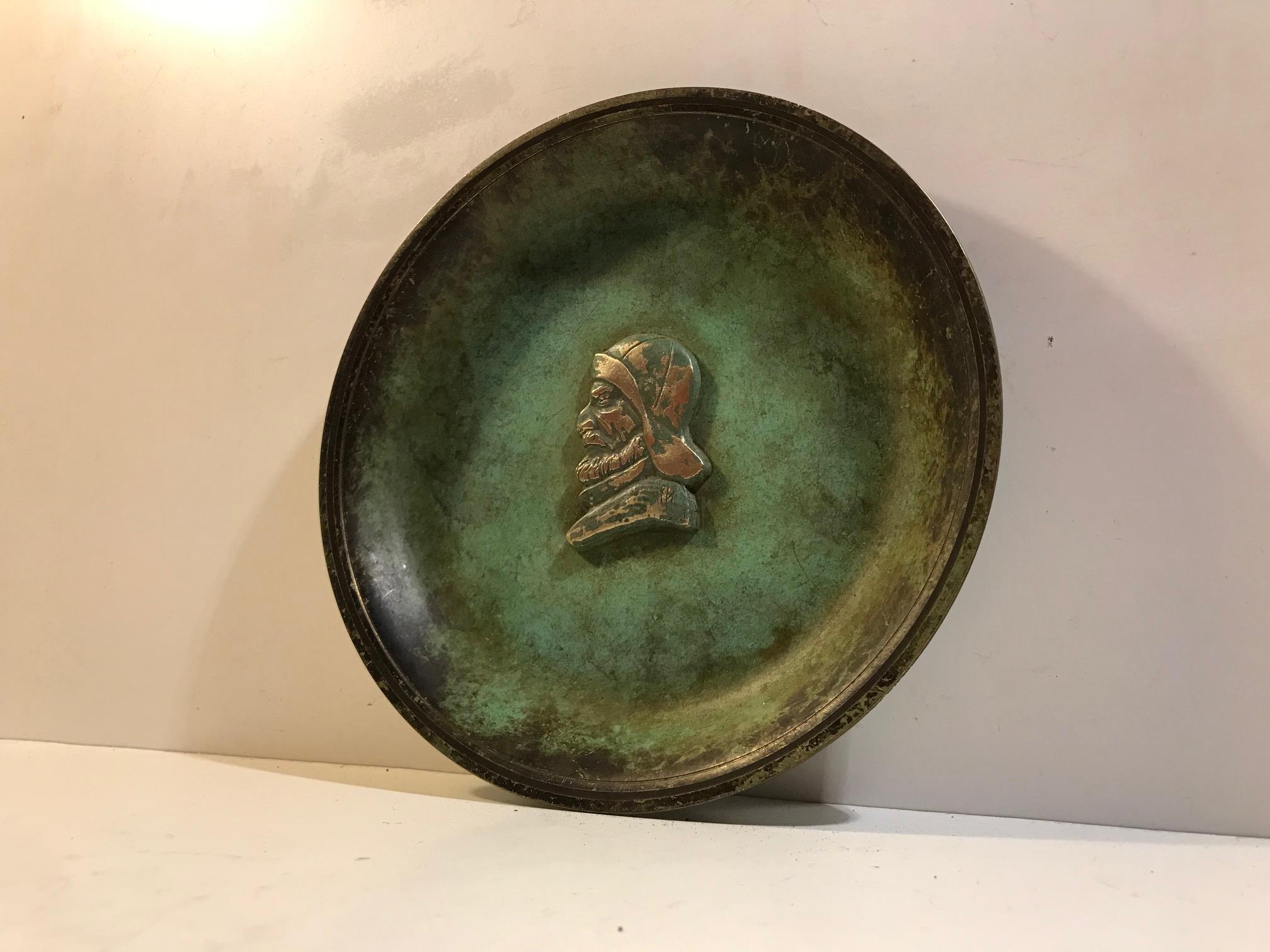 Stylized bronze dish with applied verdigris patina (cold paint). The center motif depicts a fisherman. Designed by J.F. Willumsen and manufactured by Tura in Denmark during the 1930s in a style reminiscent of Just Andersen and WMF.
