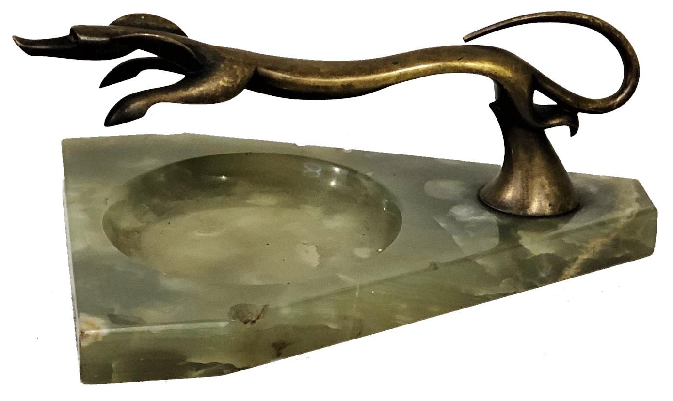 ABOUT
A vide poche—French for empty pockets—is a valet tray or empty bowl used to collect change, keys, and daily miscellany. This unique object is created during the Art Deco era (ca. 1920s) in Vienna. The vide poche itself is made in the form of a