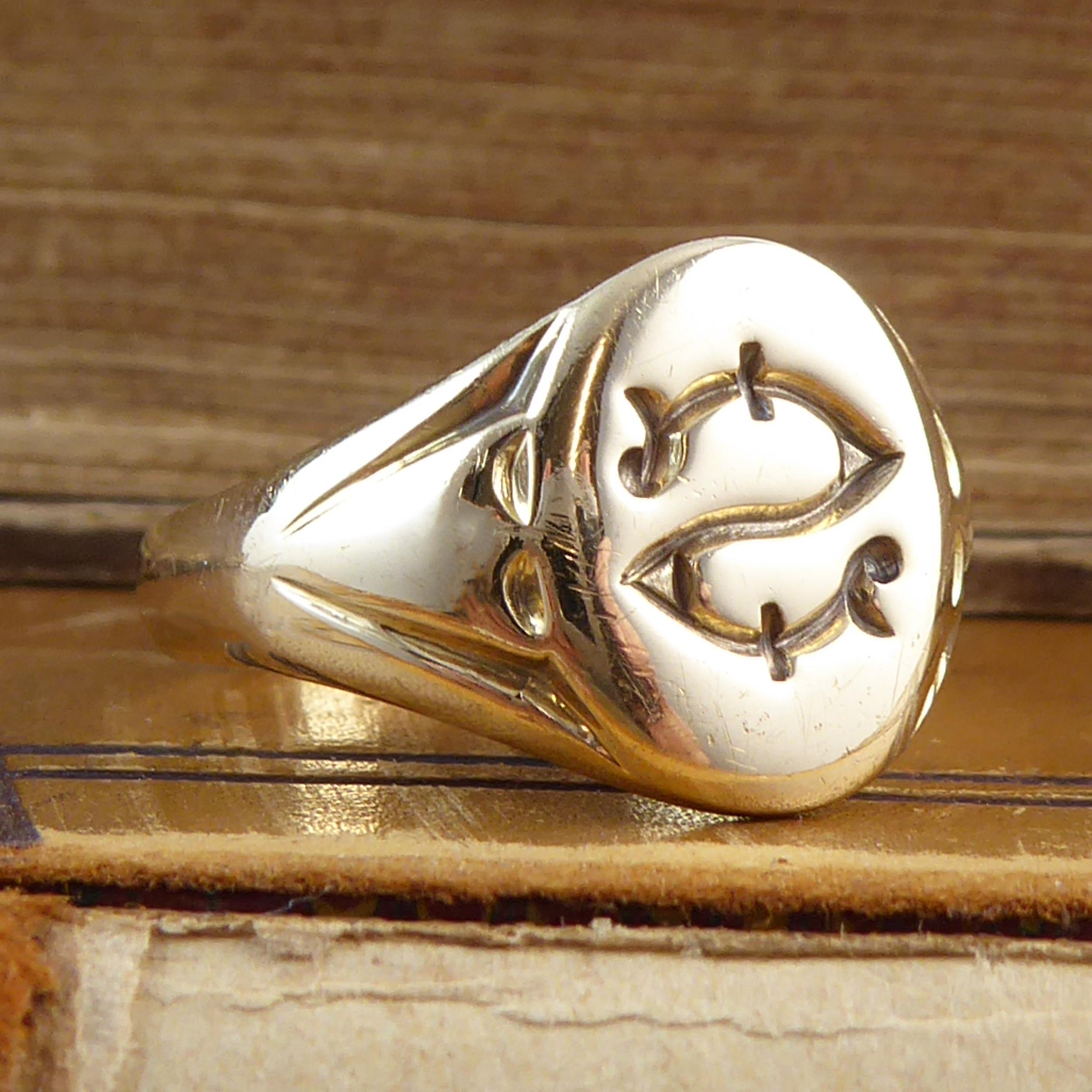 An Art Deco signet ring dating from 1927 and assay at the Chester Office.  The oval top of the ring is heavily carved with a seal insignia 
