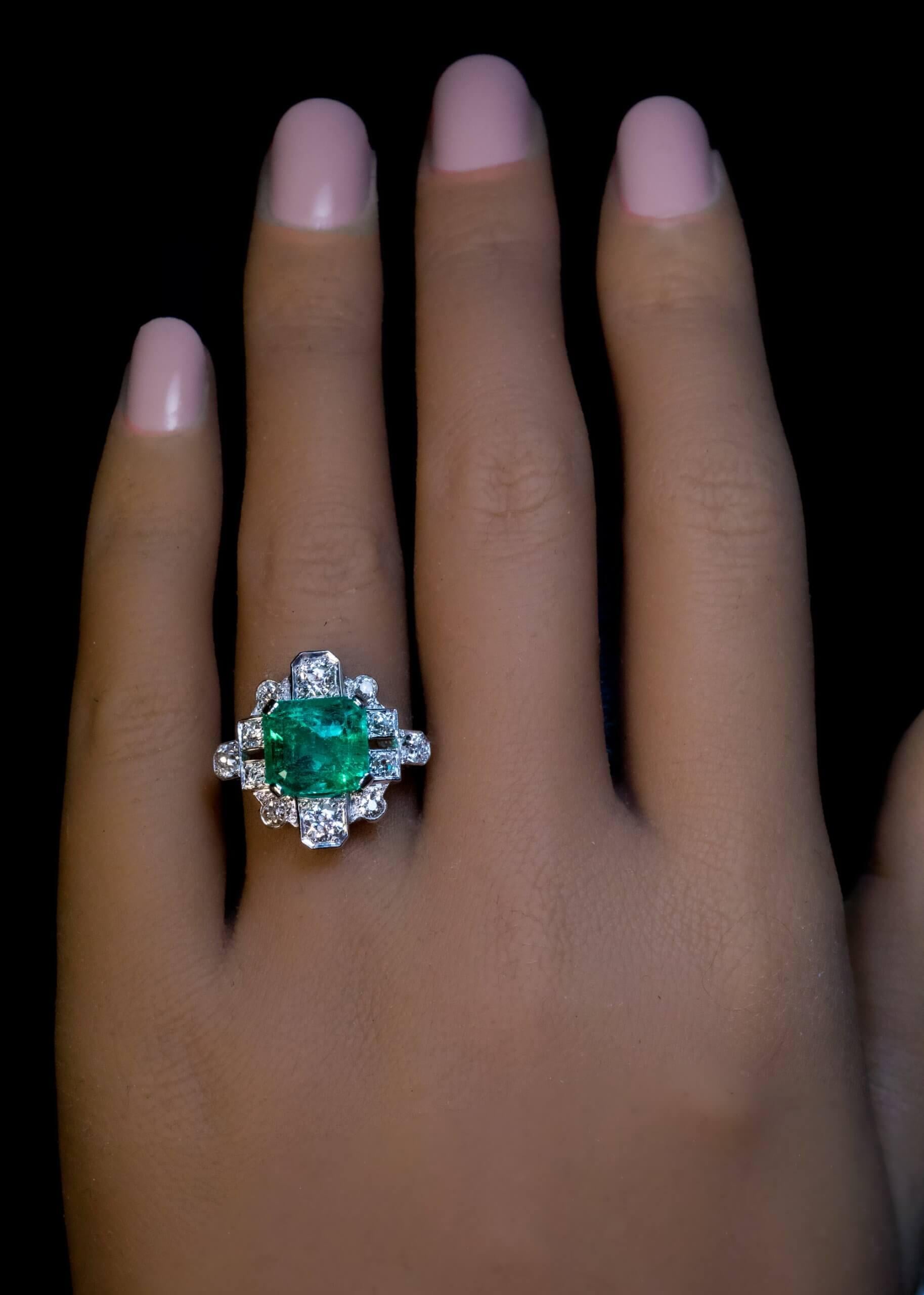 Circa 1930s
The ring is crafted in platinum and white 18K gold. It features a vibrant 3.76 ct Colombian emerald of a bright bluish green color. The emerald is framed by bright white old mine cut diamonds (F-G color, SI1-SI2 clarity).
The emerald