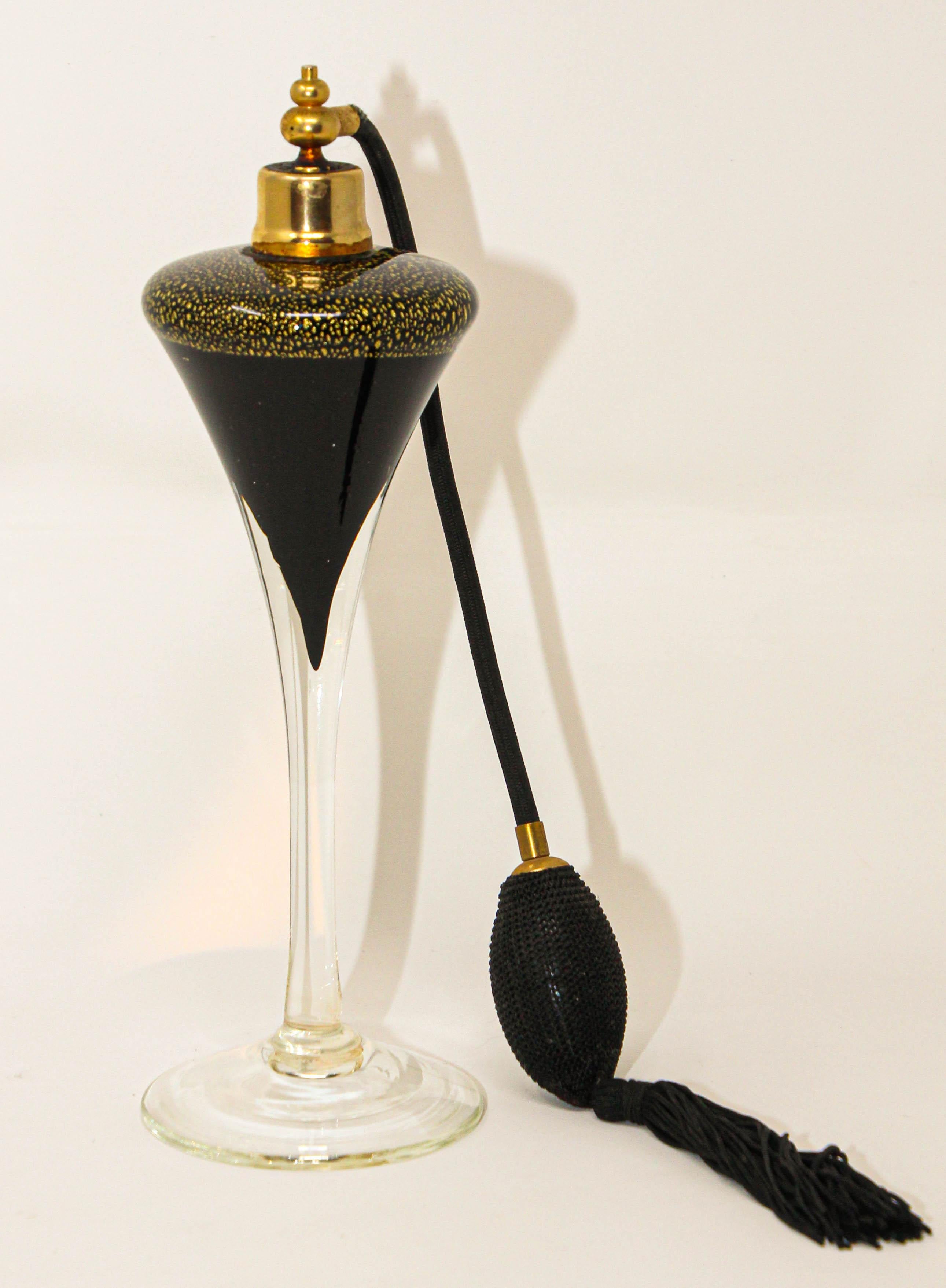 Art Deco Vintage Archimede Seguso Tall Black and Gold Perfume Bottle 1960's.
Vintage Art Deco style Archimede Seguso tall black and gold aventurine perfume bottle with black silk atomizer.
Italian Murano art glass perfume bottle black glass with