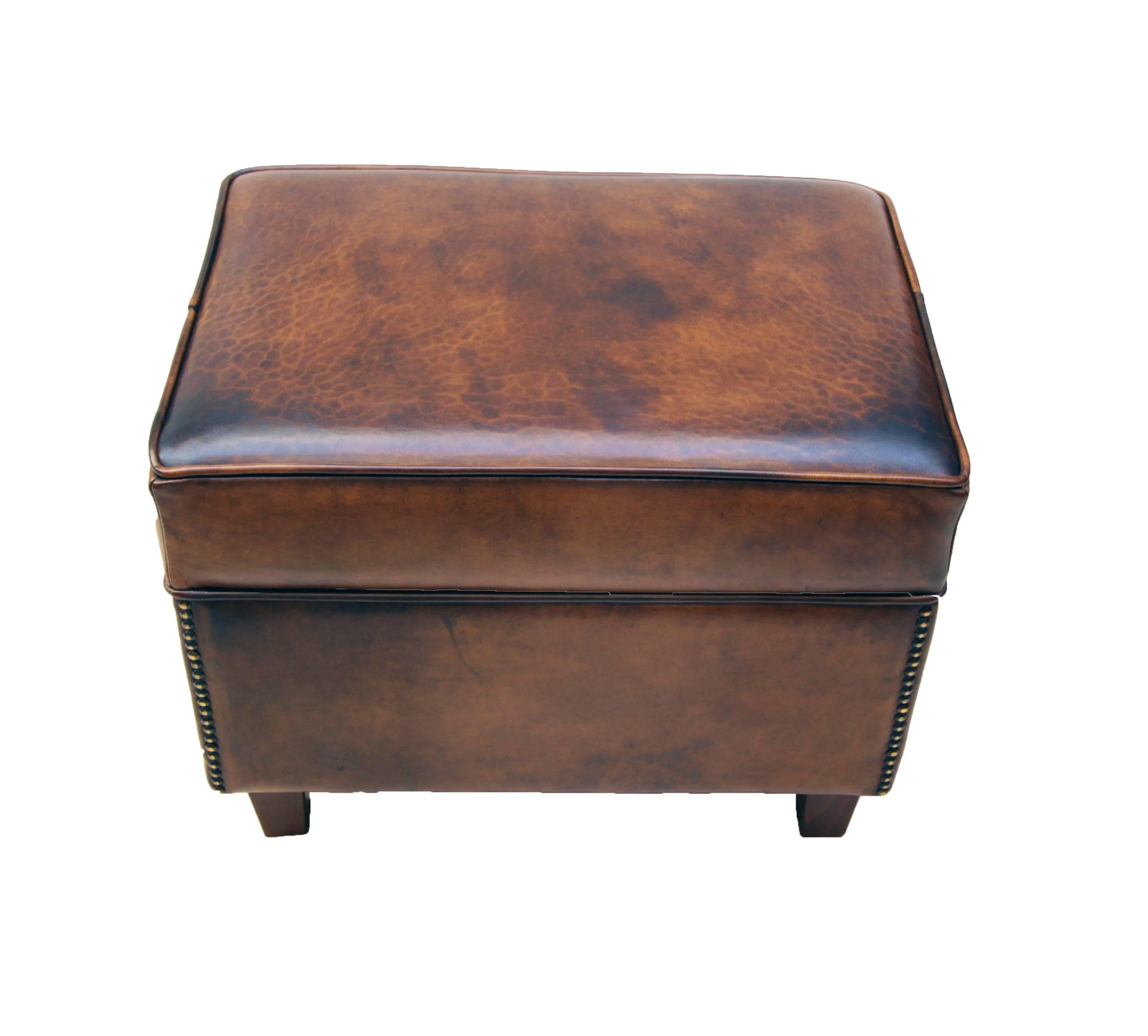 This club stool, is covered with hand-patinated sheep leather. The stool have a very nice easy shape. The leather is very sturdy and it is very comfortable.

 