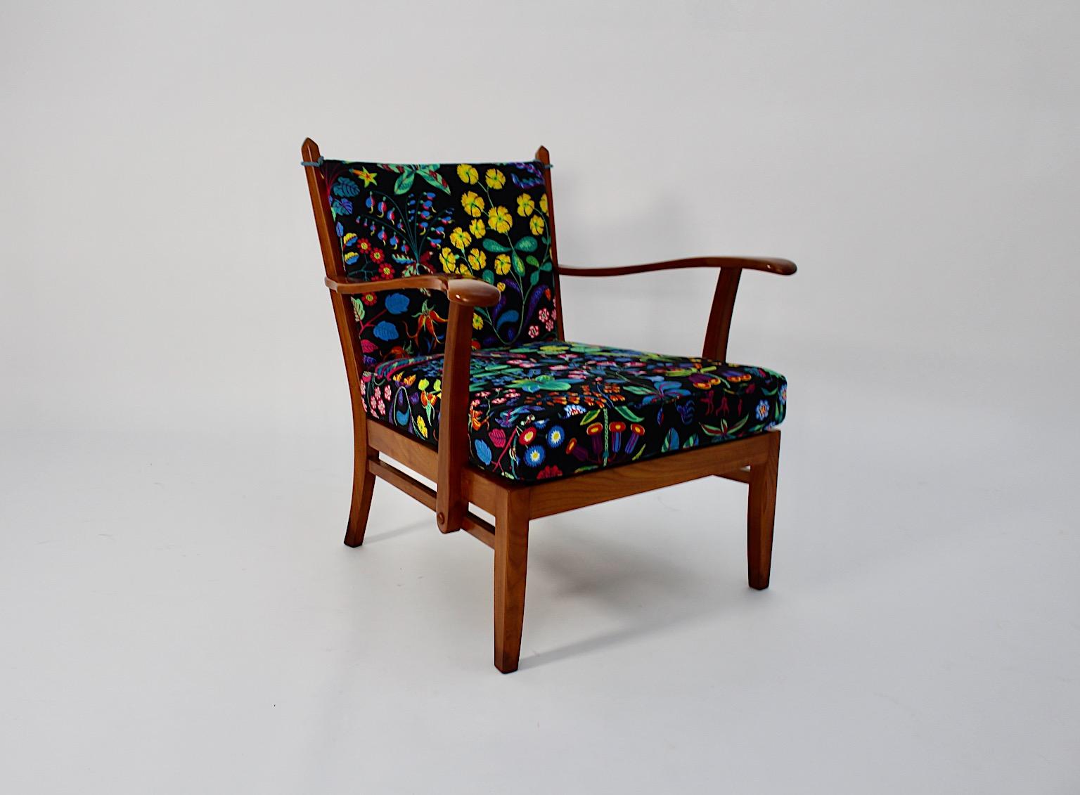 Art Deco vintage cherry armchair attributed to Josef Frank circa 1925 Austria.
A beautiful cosy armchair from solid cherry wood with replaced new hand made loose cushions attributed to designer Josef Frank.
This armchair shows a wonderful honey