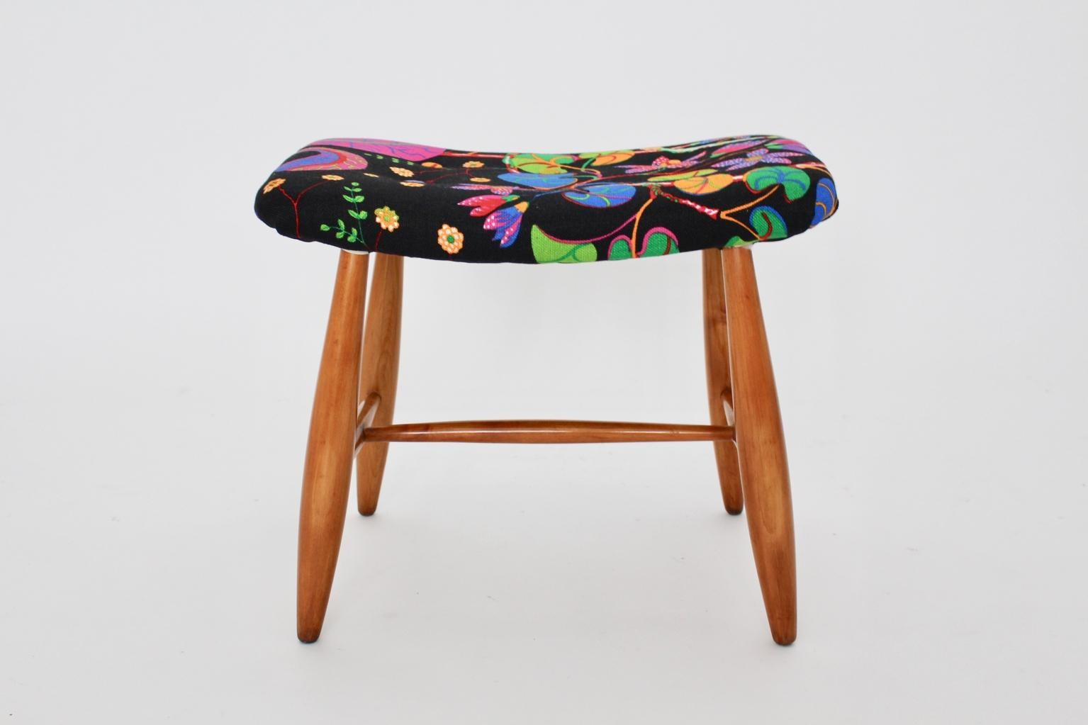 Art Deco vintage stool from cherrywood and fabric by Josef Frank for Haus and Garten, circa 1925 Vienna.
While the frame from solid cherrywood in an amazing warm color tone the upholstery is renewed with lush and colorful textile fabric by Josef