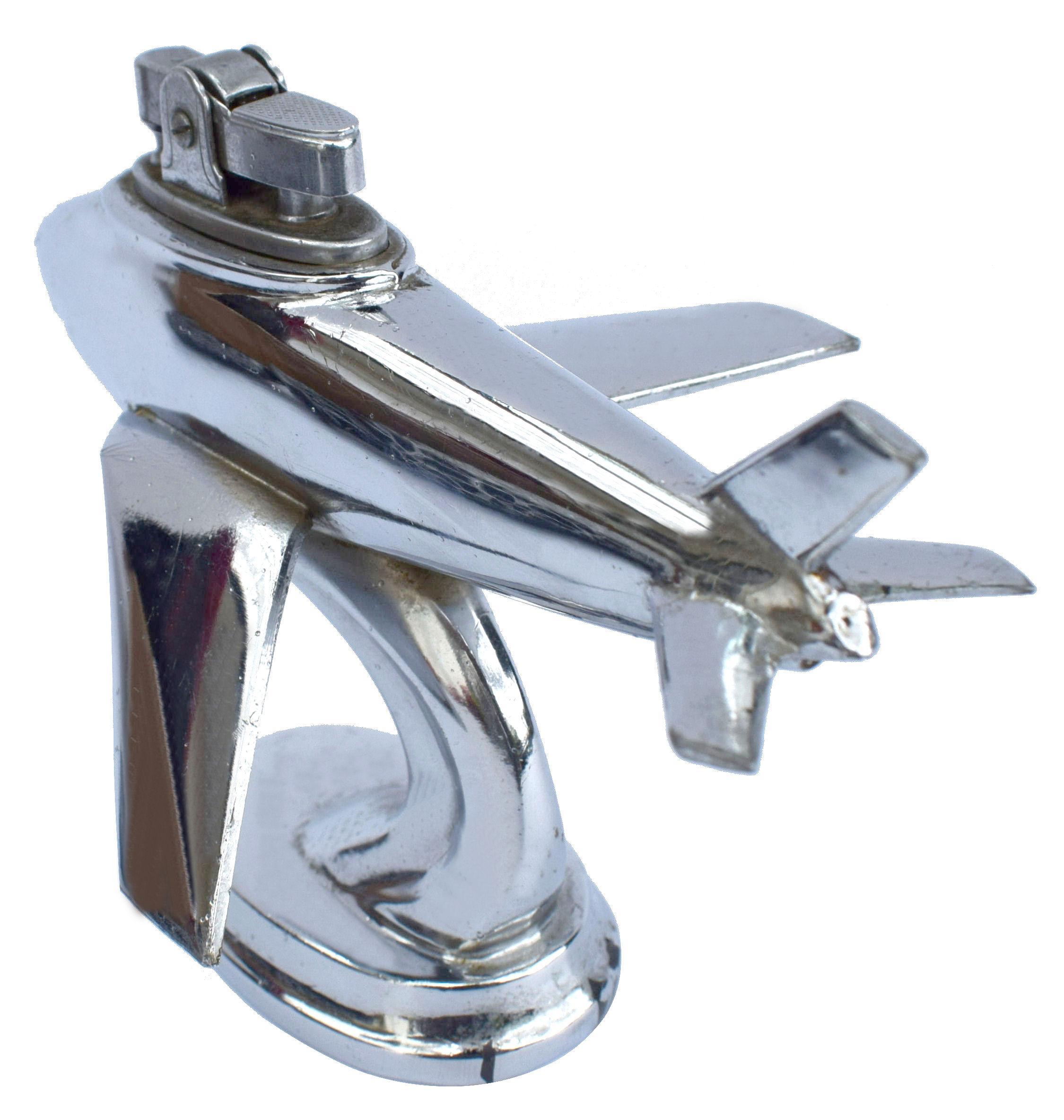 For your consideration is this rather charming chrome table lighter in the form of an airplane. No makers name but we think this likely dates to circa 1950s. Not tested as without fuel but everything seems in order.