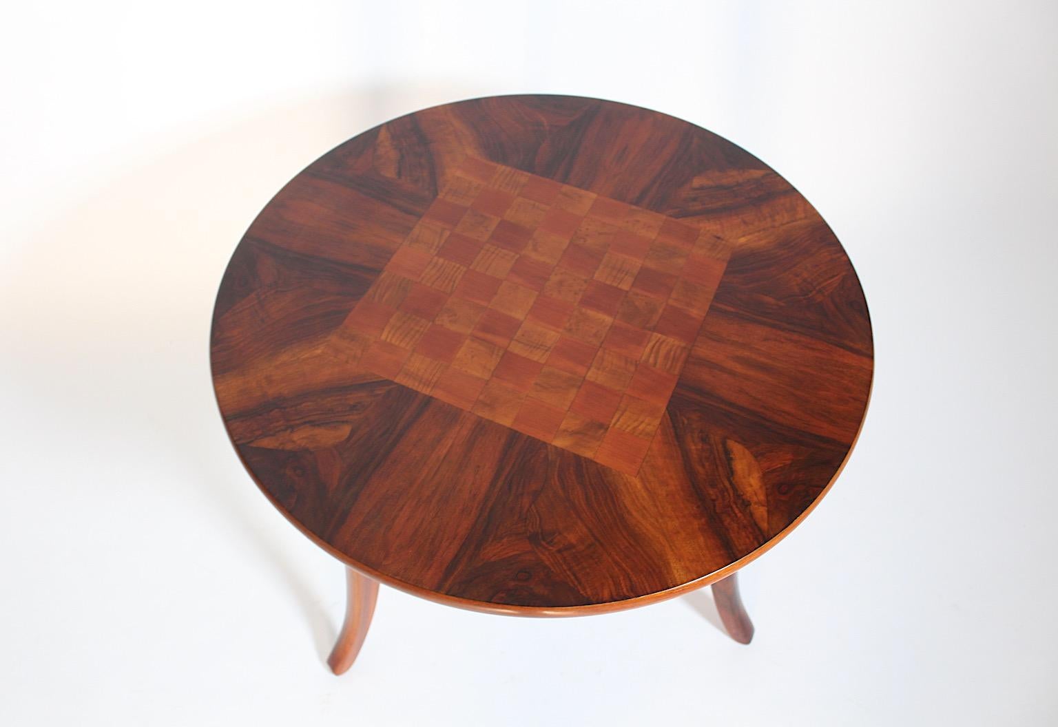 Art Deco vintage side table or coffee table circular like with a chess table top from walnut, cherry and poplar veneer by Josef Frank for Haus & Garten circa 1925 Vienna.
An amazing side table with chess pattern topped from solid walnut, cherry and