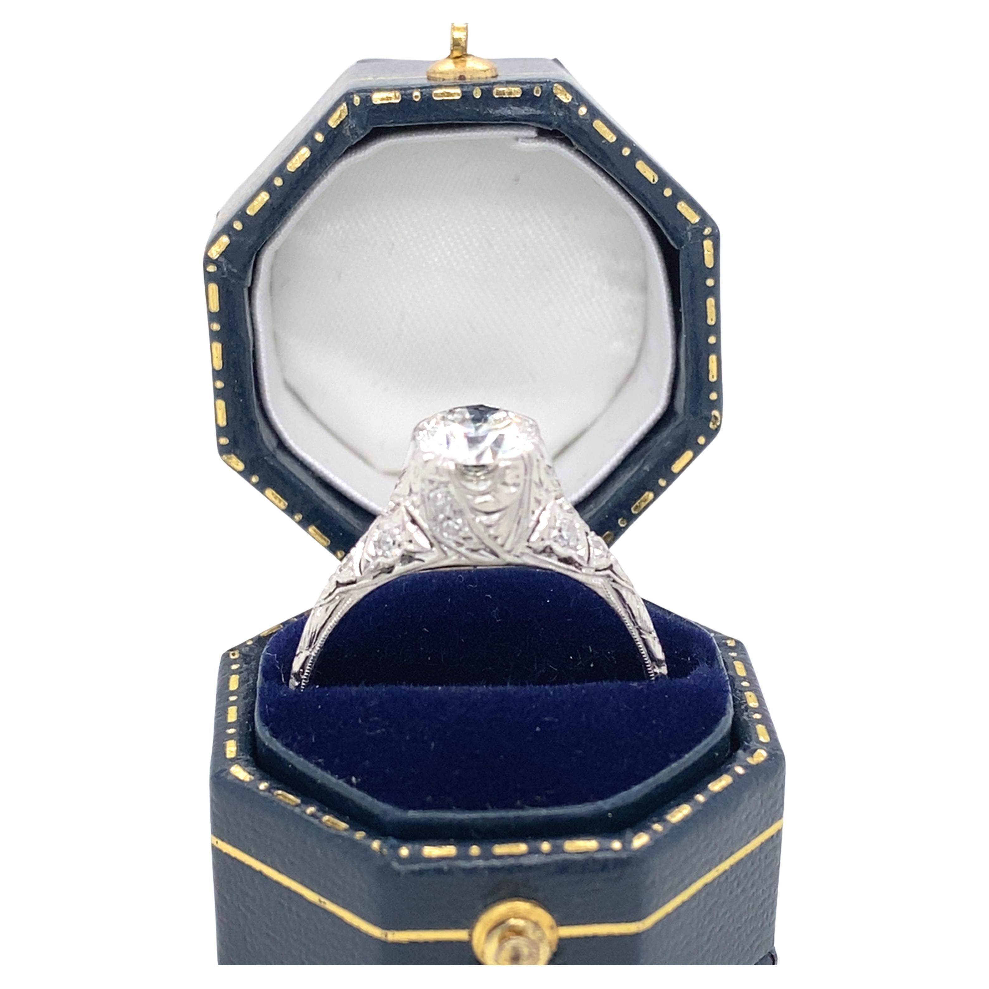 Art Deco Vintage Transitional Round Diamond and Platinum Engagement Ring