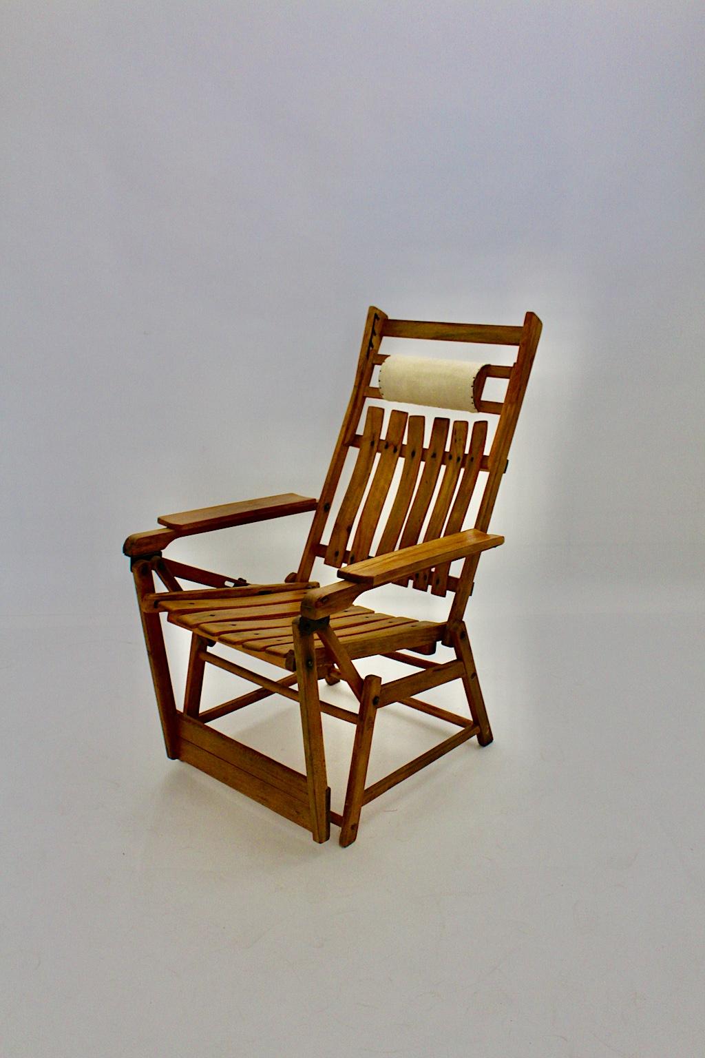 Art Deco vintage beechwood lounge chair or armchair, which was designed by Hans and Wassili Luckhardt 1934-1936 for Gebr. Thonet Frankenberg / Eder.
This oiled beechwood construction shows design features like an adjustable backrest into 4