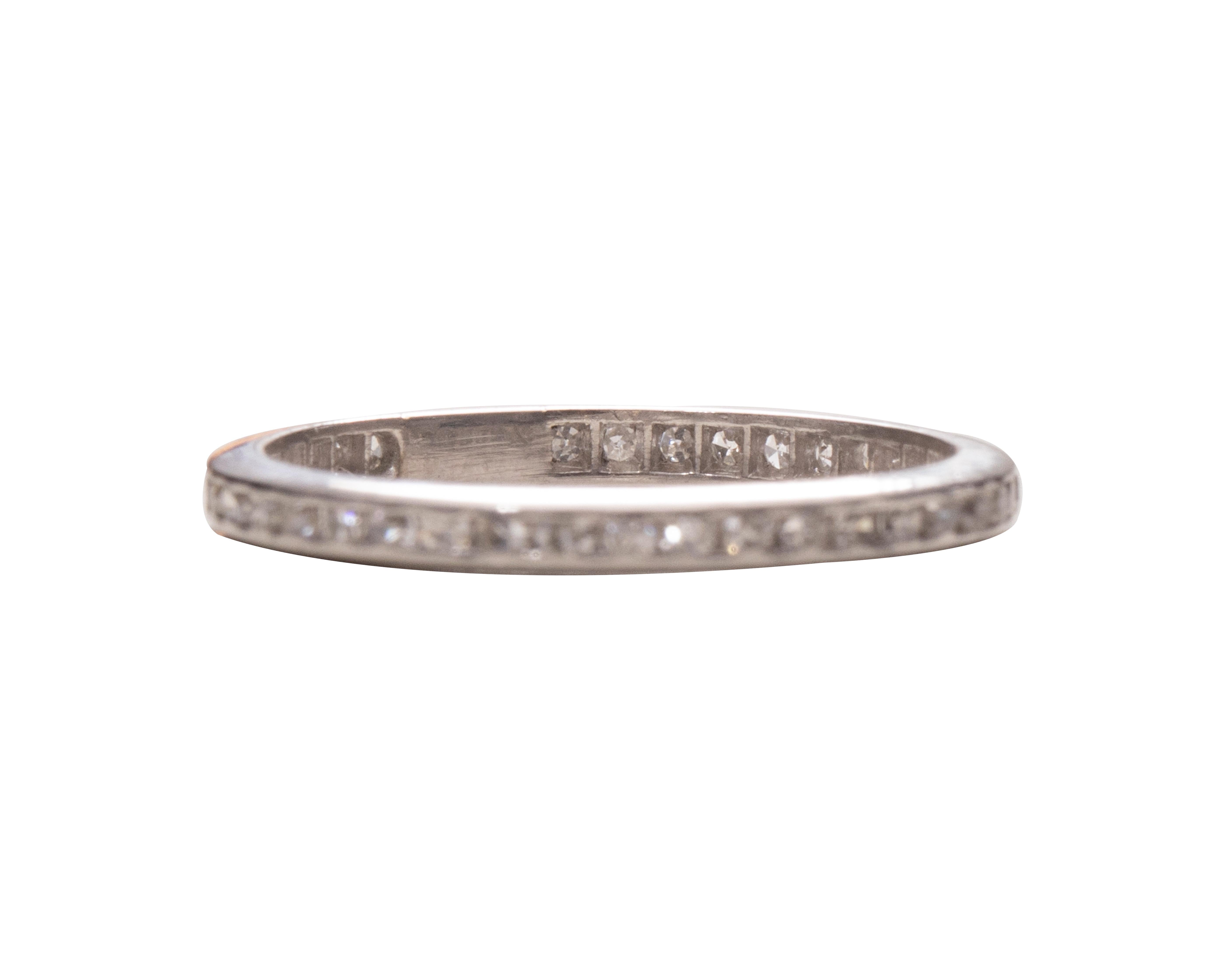 Here we have a vintage 1920's Platinum and diamond wedding band! The shimmering diamonds are .65 carats of classic beauty. This fantastic band also features a small space for sizing which is extremely hard to find in this style of band! What a