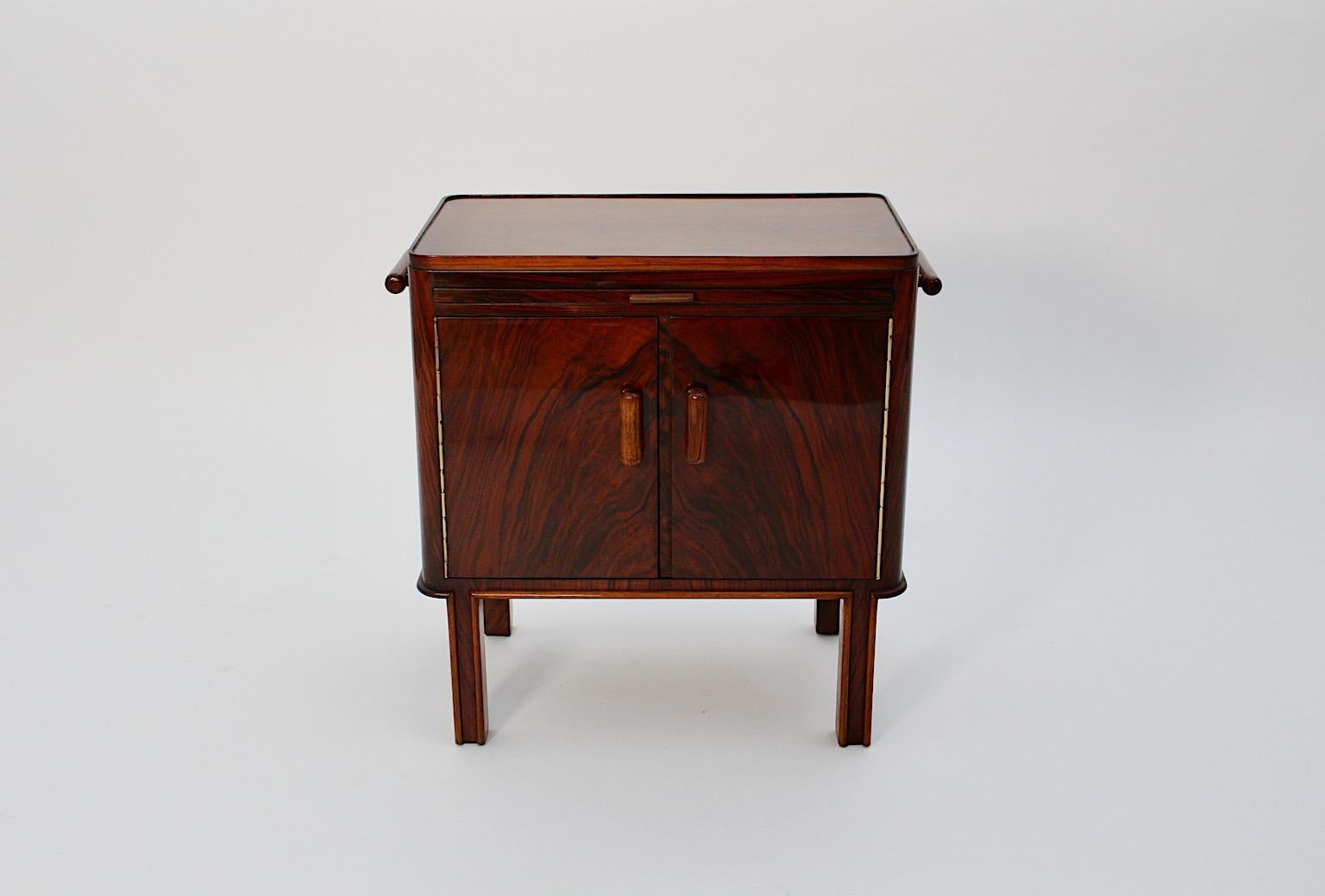 Art Deco vintage side table or chest from walnut Vienna 1930s.
A wonderful freestanding Art Deco chest or side table from the range of 
