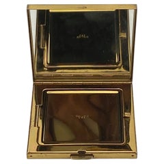 Art Decó Volupté USA Compacto dorado con adornos de brillantes, años 50