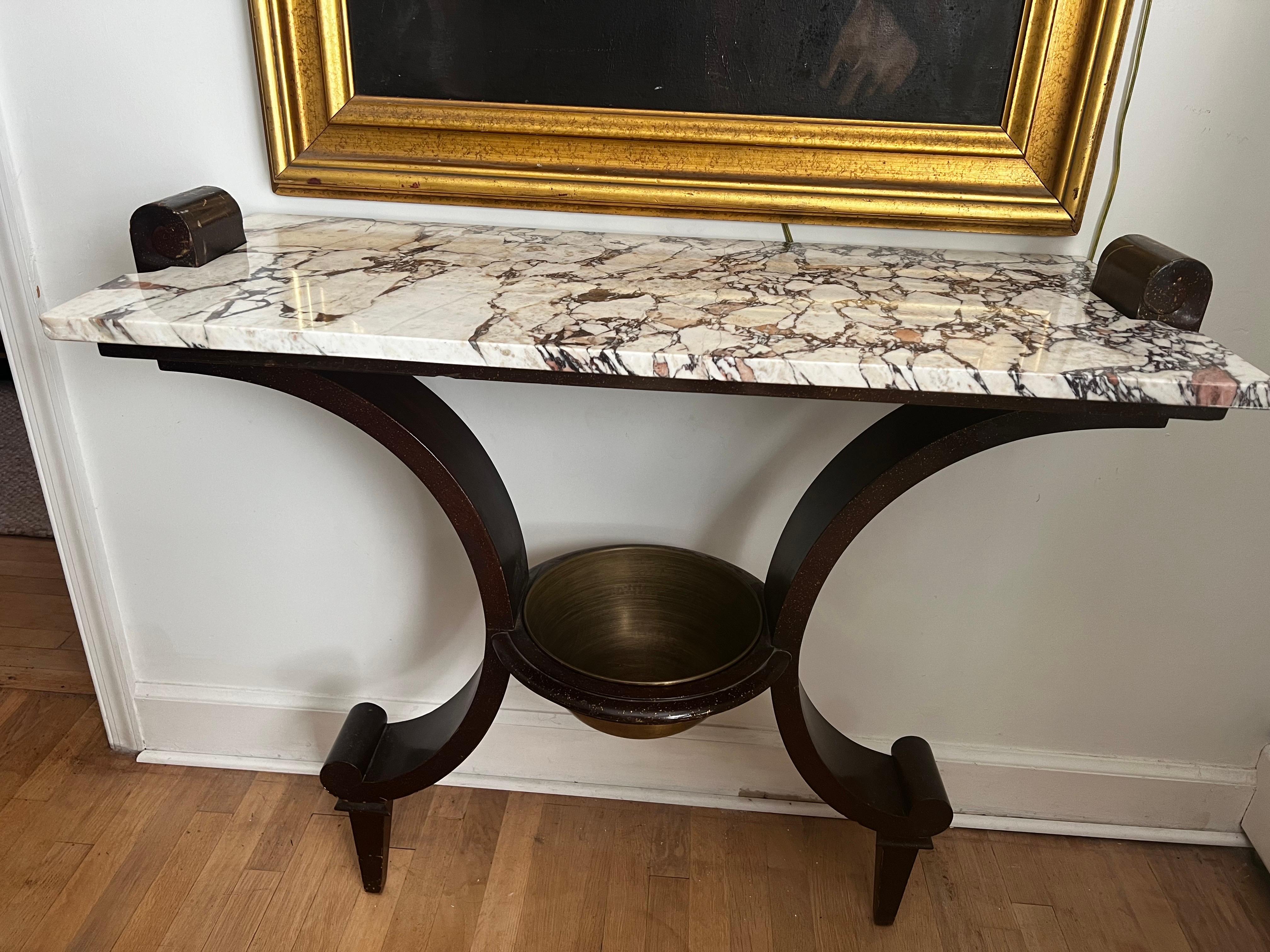 Art Deco entry console table with Calacatta Viola Mable top.  
Wood piece must be attached to the wall.

Table is 35 inch height at marble, but please note, the top of wood scroll is 37