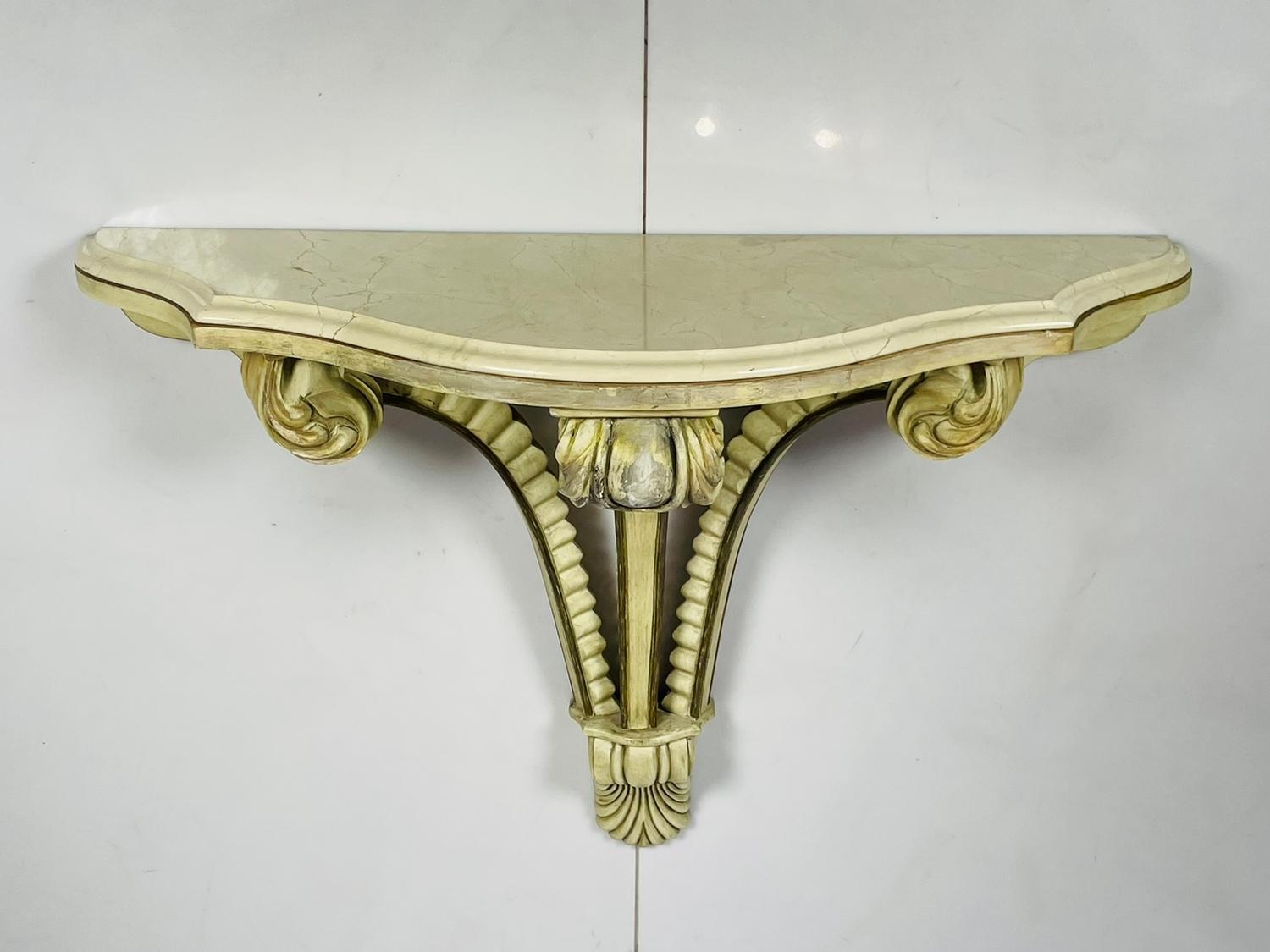 Introducing our exquisite Art Deco Wall Console With a Marble Top, proudly made in the USA during the 1940s. This stunning piece of furniture is sure to elevate your home décor with its vintage charm and timeless elegance.

Crafted from