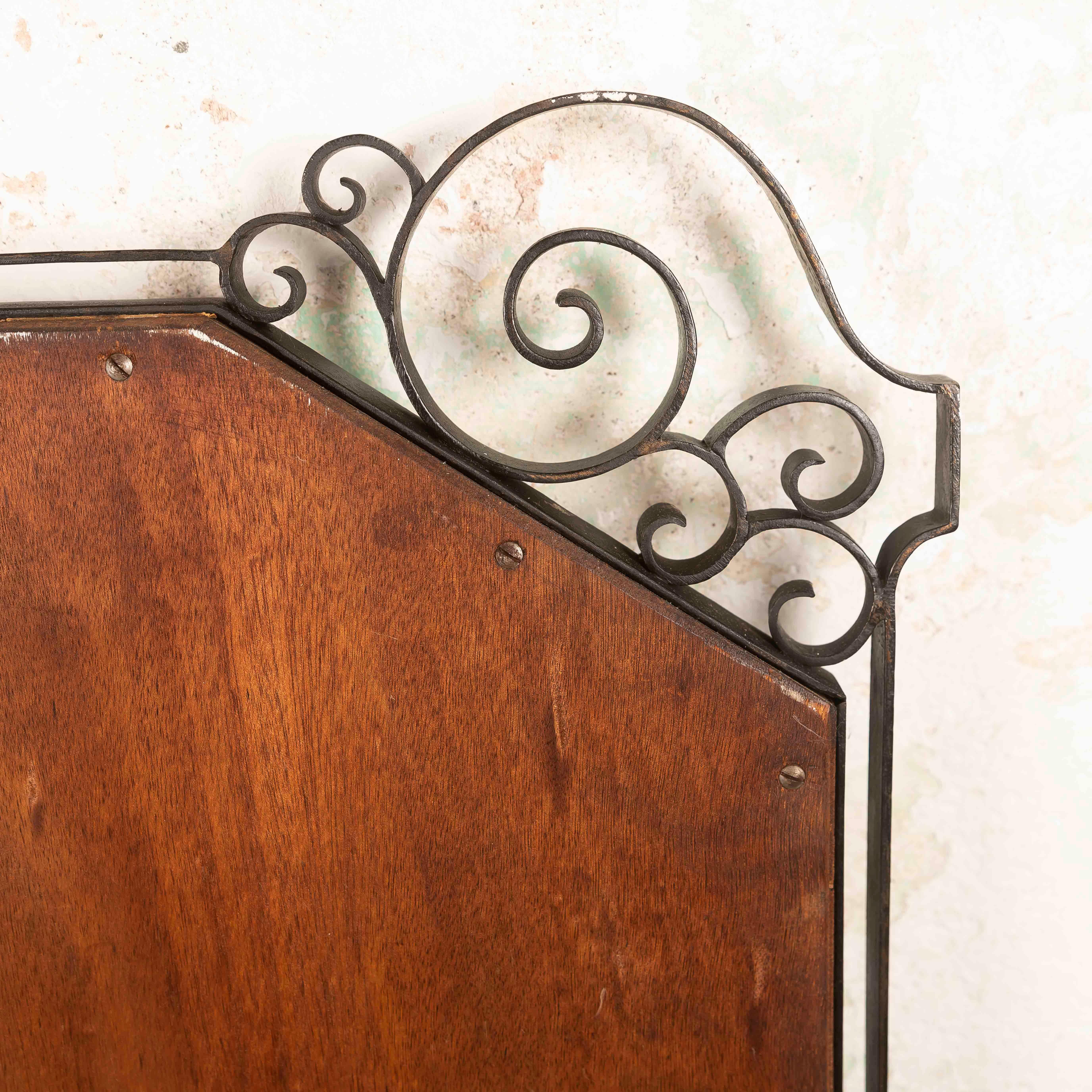 French Art Deco wall Mirror in the manner of Edgar Brandt, France 1940s For Sale