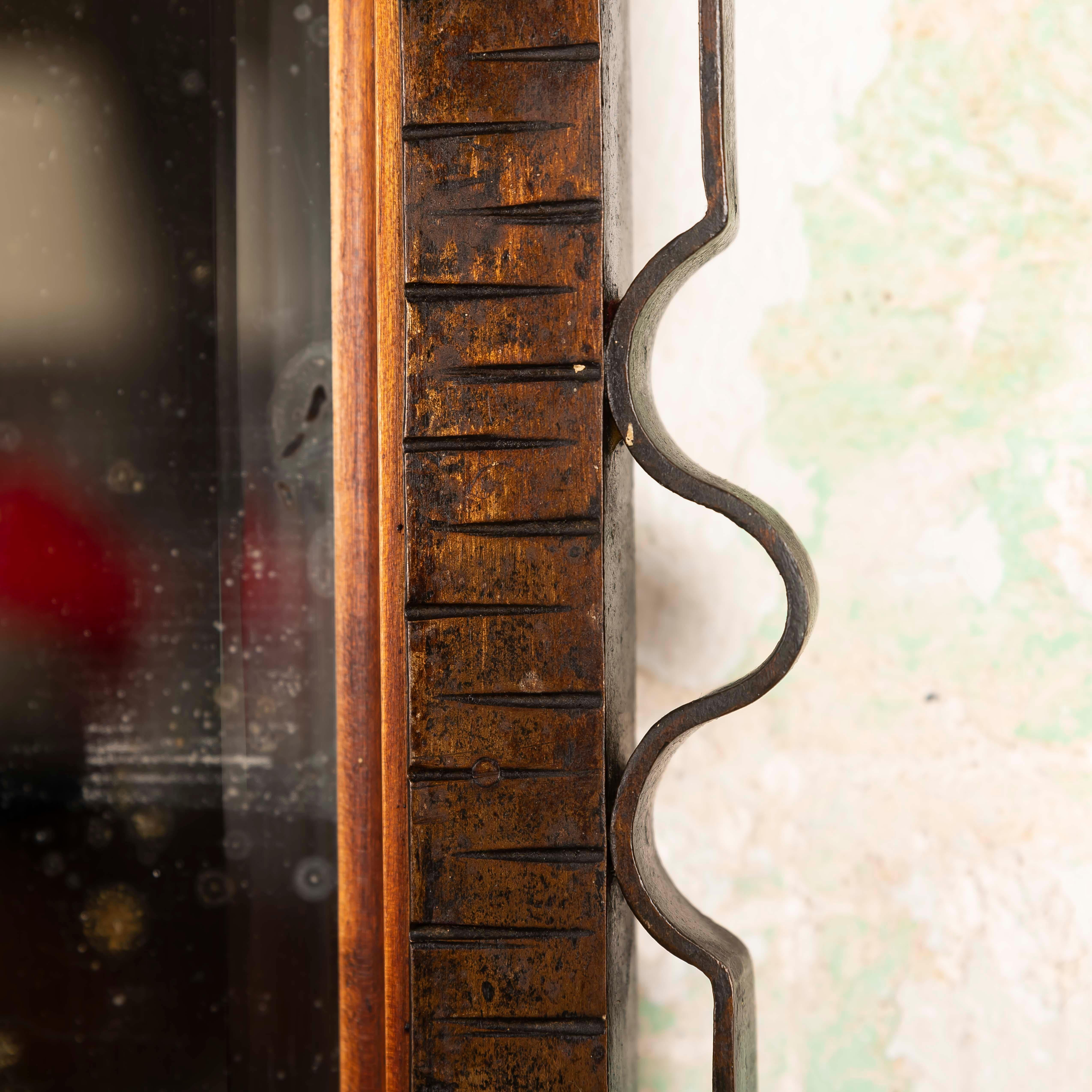 Mid-20th Century Art Deco wall Mirror in the manner of Edgar Brandt, France 1940s For Sale