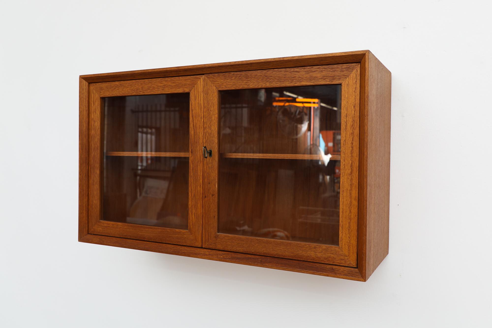 Dutch Art Deco Wall Mount Cabinet With Glass Doors For Sale