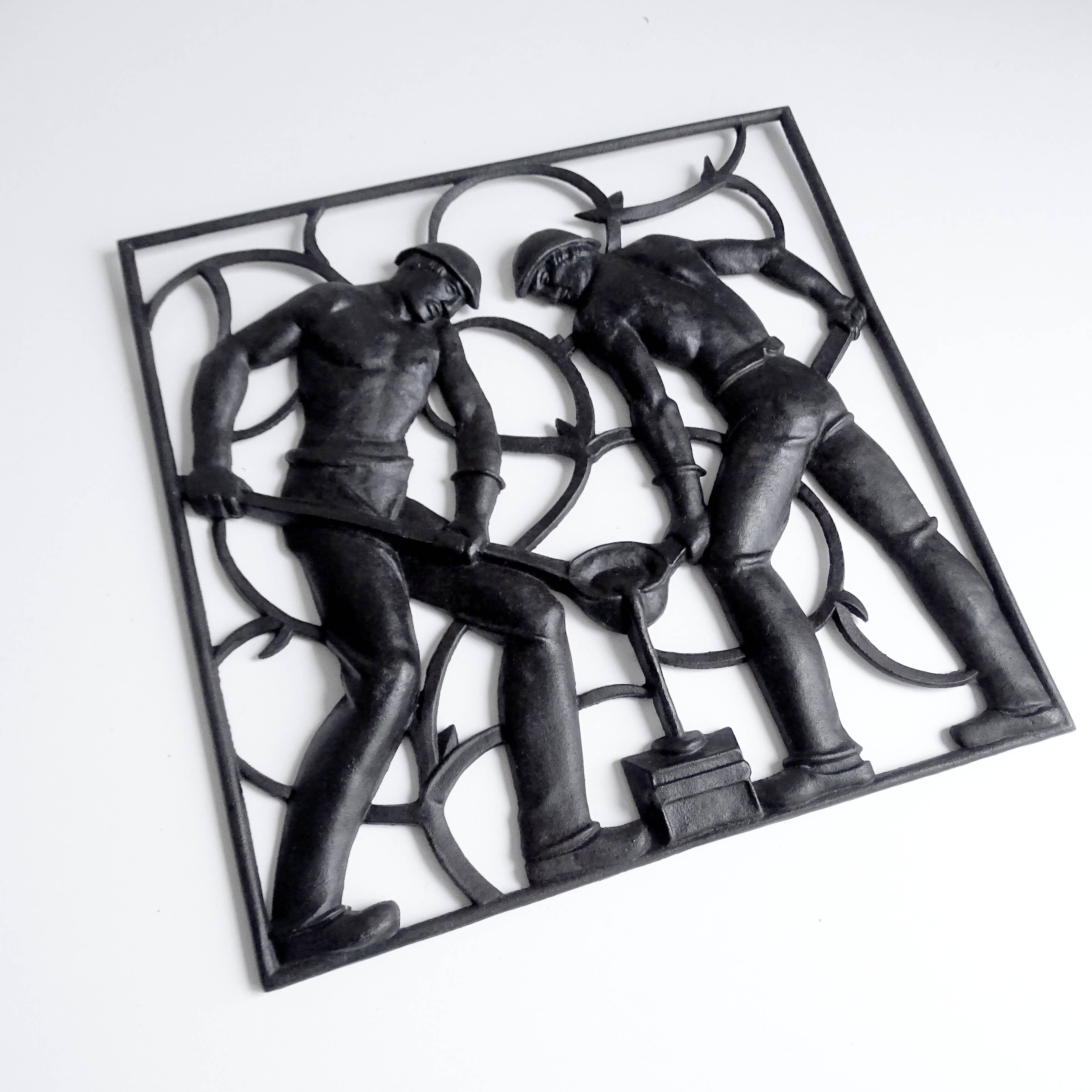 Very rare original Art Deco era wall sculpture / panel manufactured, circa 1925-1930, featuring two forge workers pouring iron. Notice the plasticity of the details which makes this striking piece so remarkable.
Dimensions
H 11.82 in. x W 11.82 in.