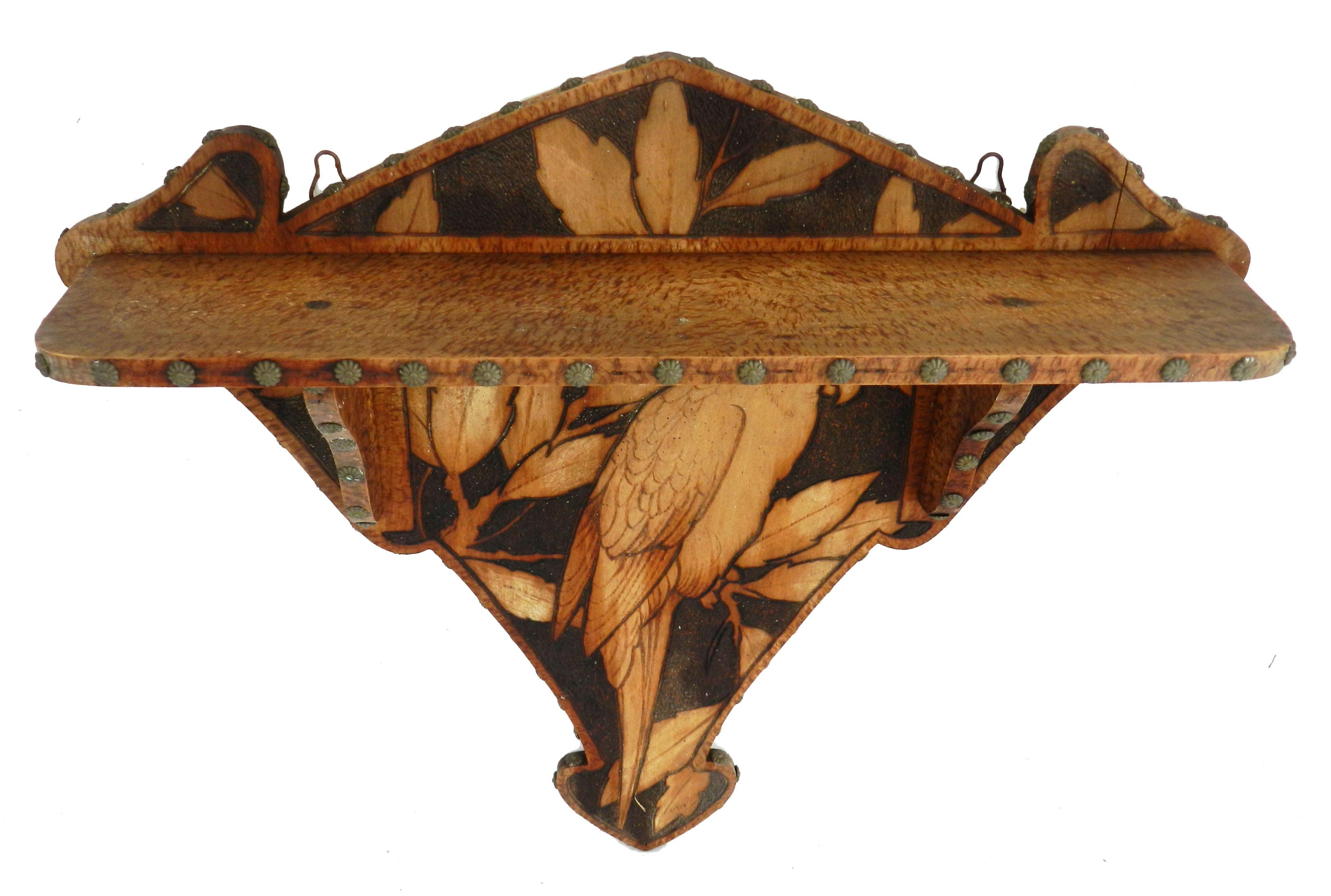 Art Deco wall shelf parrot wood, circa 1930
Pokerwork Pyrogravure Pyrograph
Unusual decorative with a parrot
One of a kind
Very good condition for its age wonderful patina with small joint that doesn't move in anyway.
