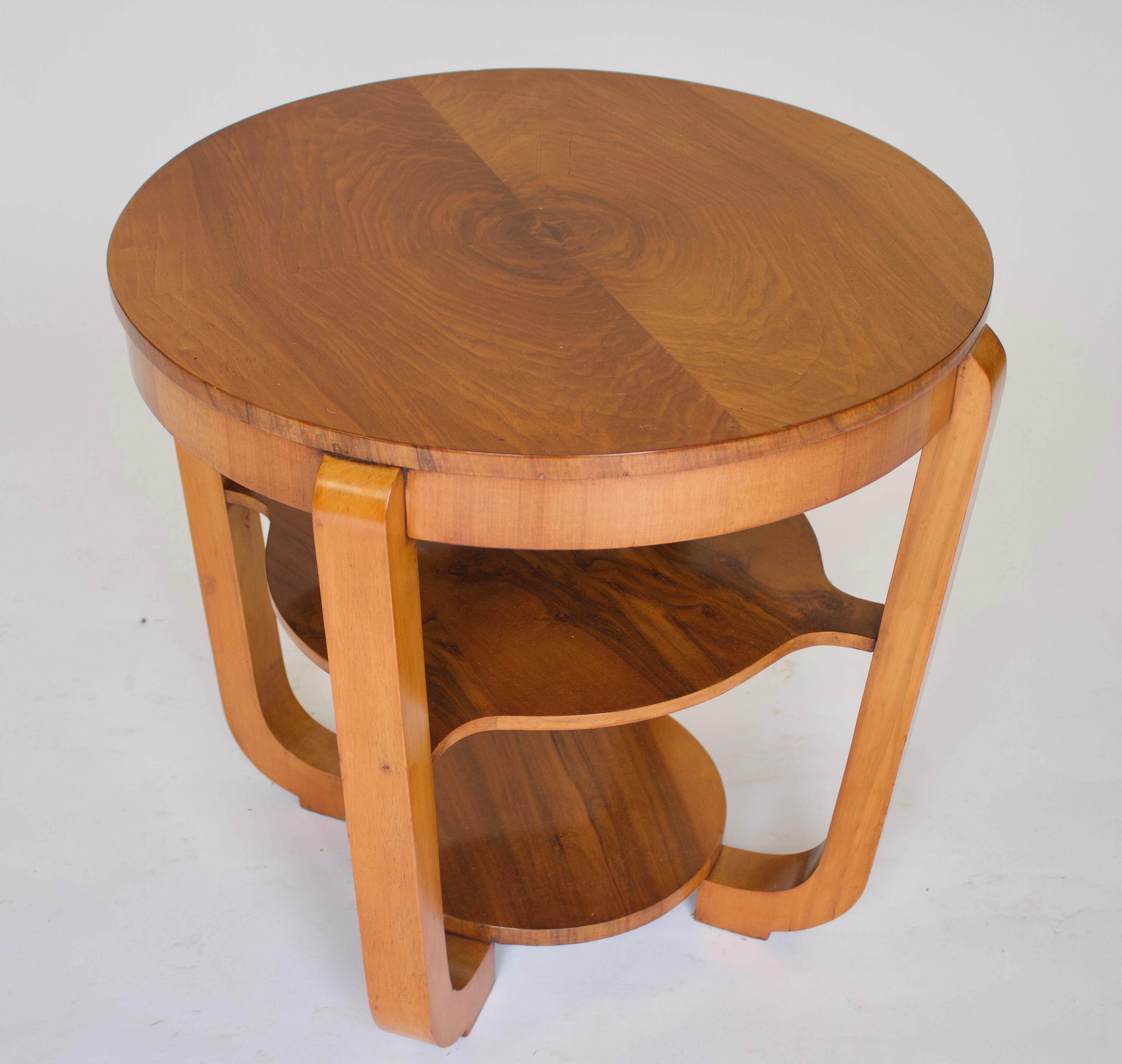 Art Deco Walnut 3 Tier Table circa 1930s
Circular top with walnut quarter veneer, 58cm diameter
both undertiers with walnut veneer, 
supported by 4 shaped square legs curved at base
Recently Polished
