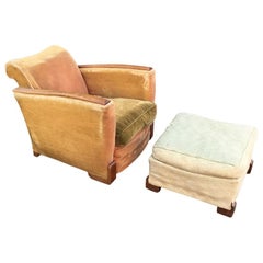Art Deco walnut Armchair and its Footrest, circa 1930