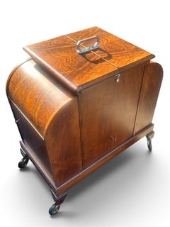 Art Deco Walnut Asprey "Elevette" Patent Mechanical Drinks Cabinet, circa 1930s.