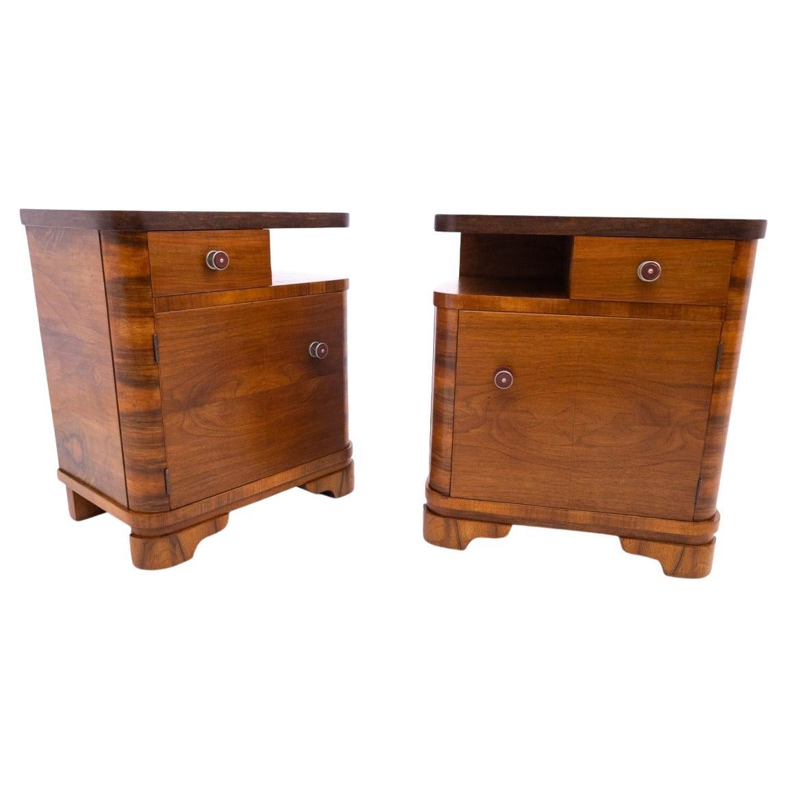 Art Deco walnut bedside tables, mid-20th century, Poland.